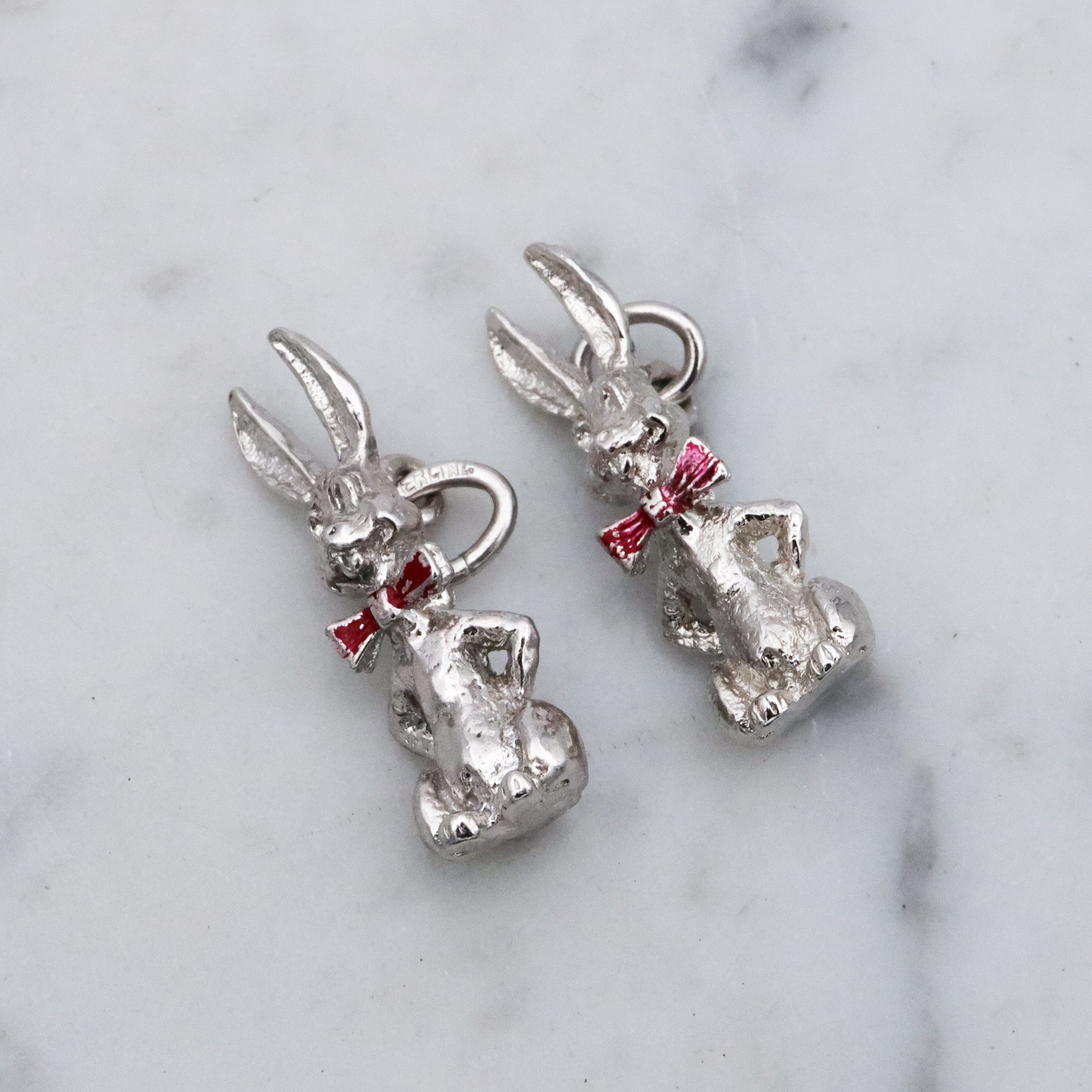 Vintage sterling seated bunny with red bowtie & nodding head