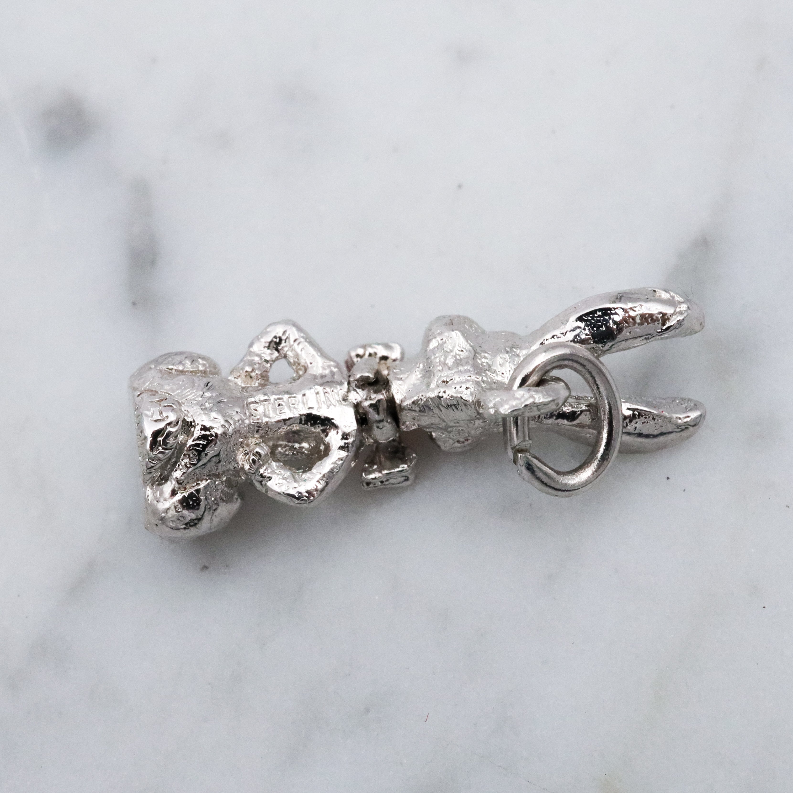 Vintage sterling seated bunny with red bowtie & nodding head