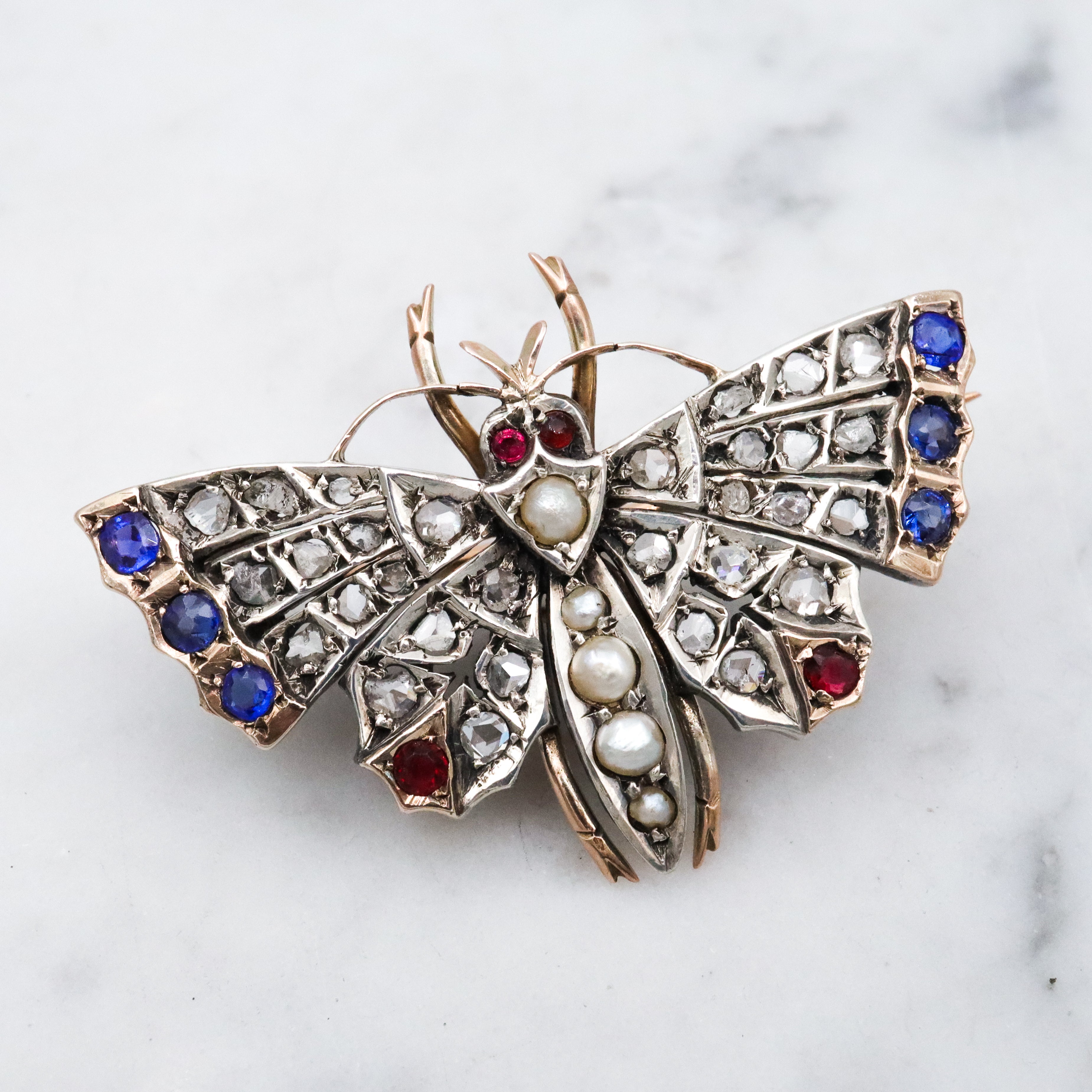 Antique Victorian rose cut diamond, ruby, & sapphire butterfly brooch