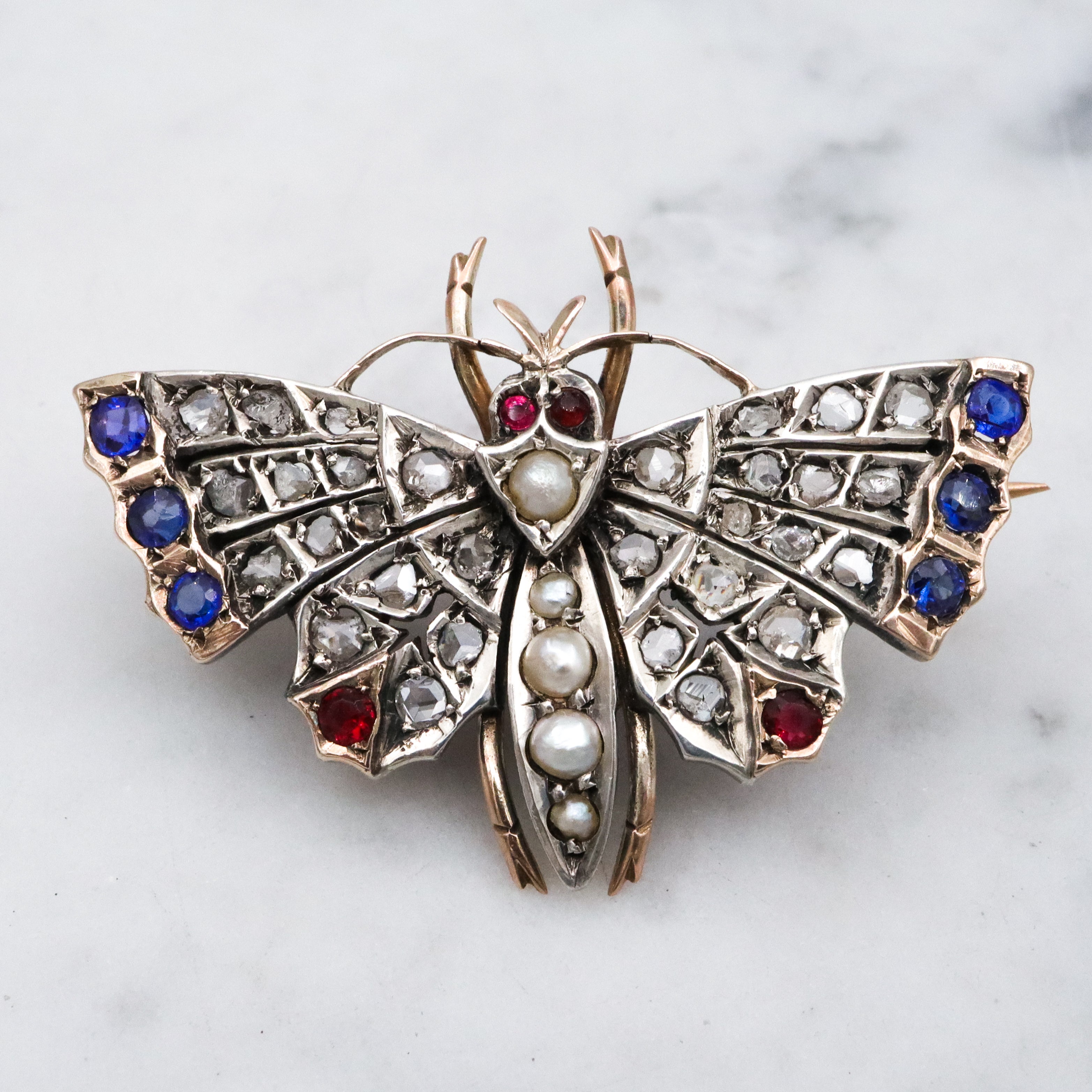 Antique Victorian rose cut diamond, ruby, & sapphire butterfly brooch