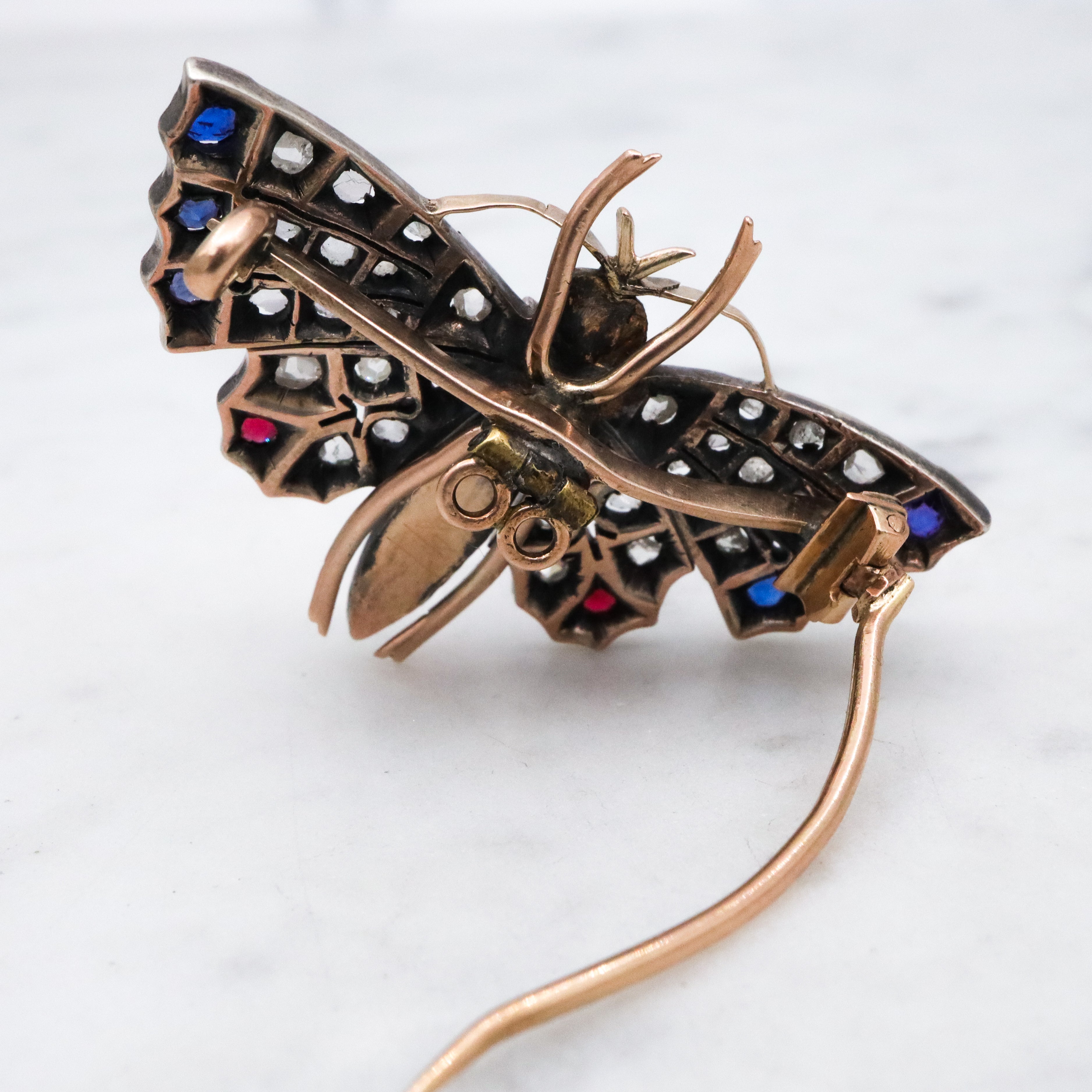 Antique Victorian rose cut diamond, ruby, & sapphire butterfly brooch