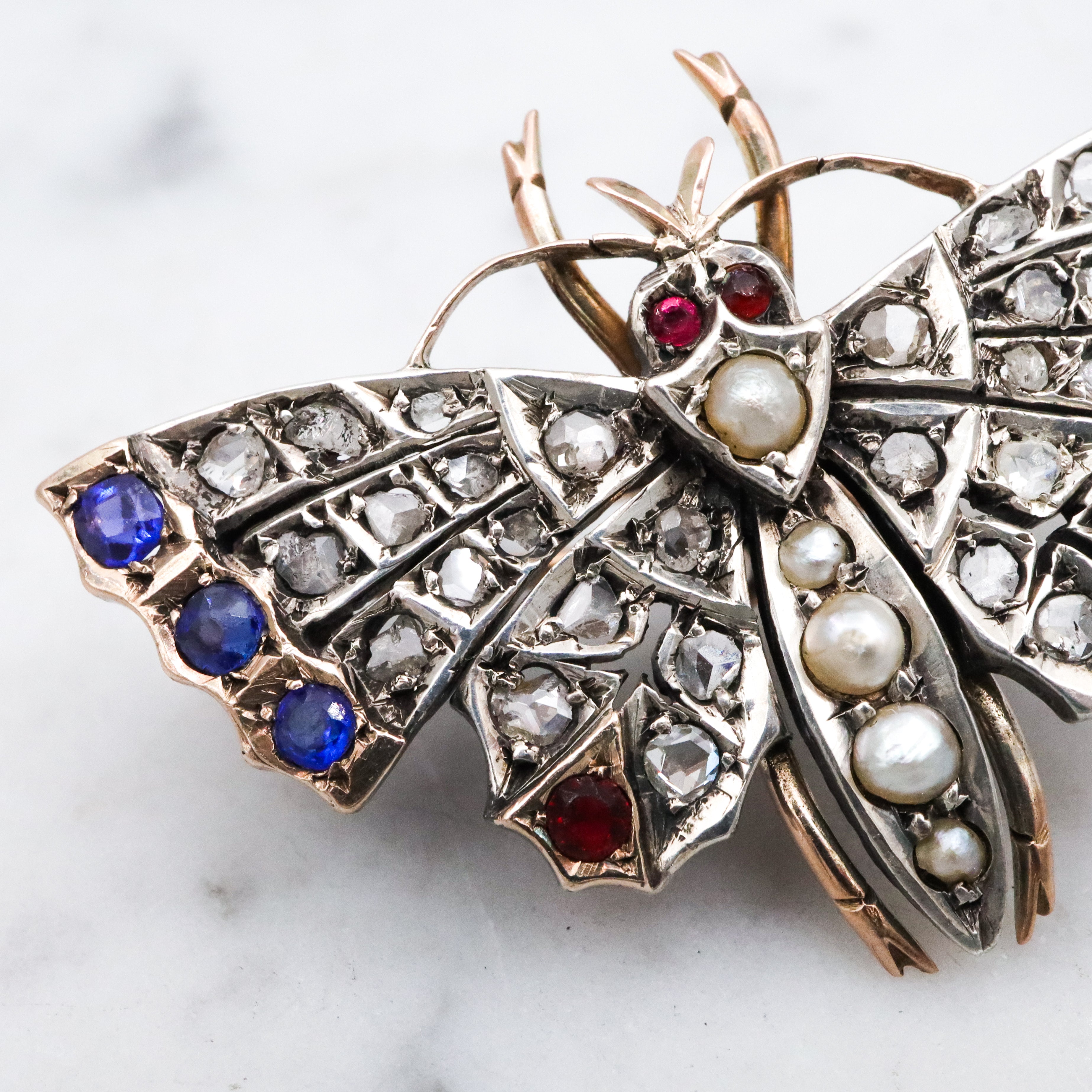 Antique Victorian rose cut diamond, ruby, & sapphire butterfly brooch