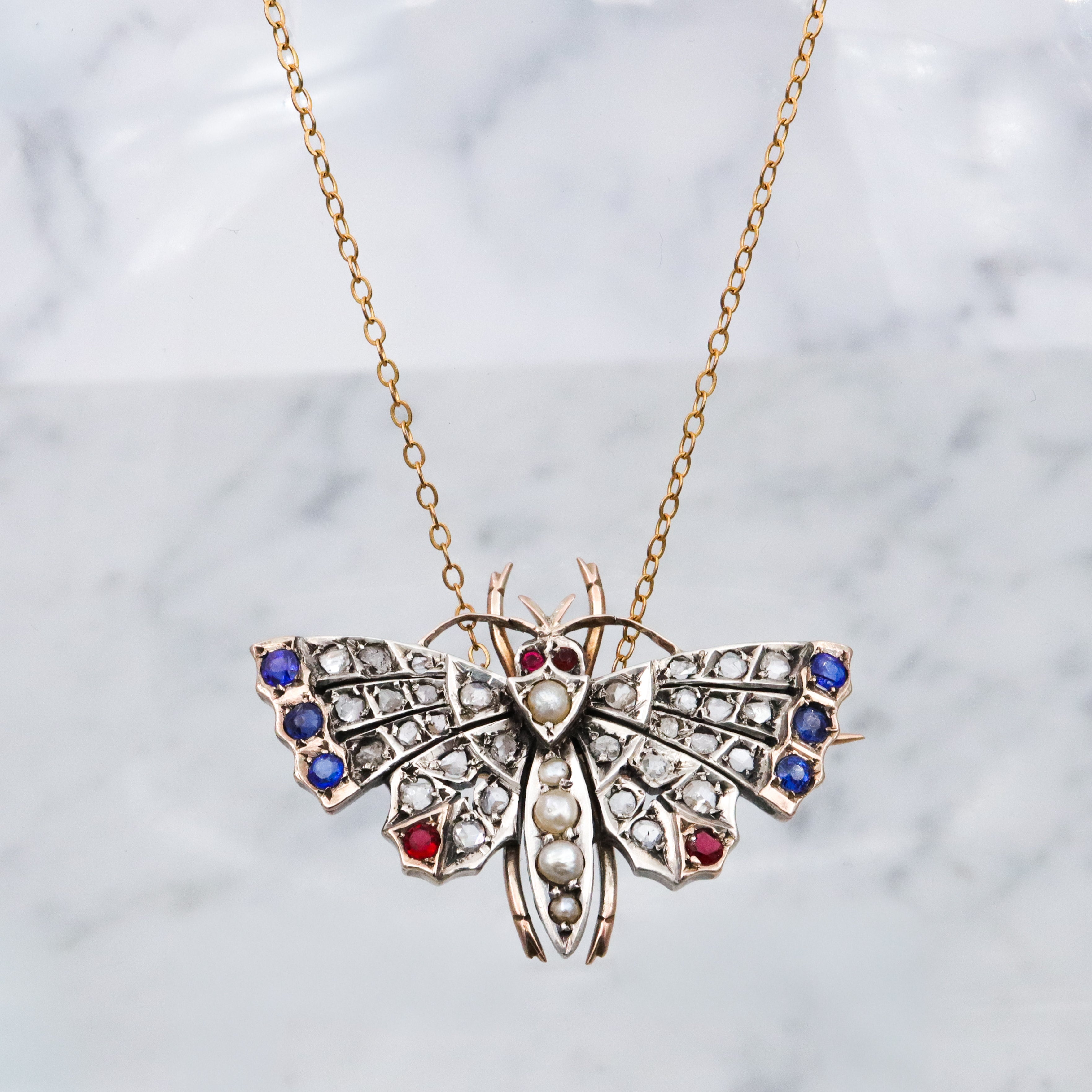 Antique Victorian rose cut diamond, ruby, & sapphire butterfly brooch