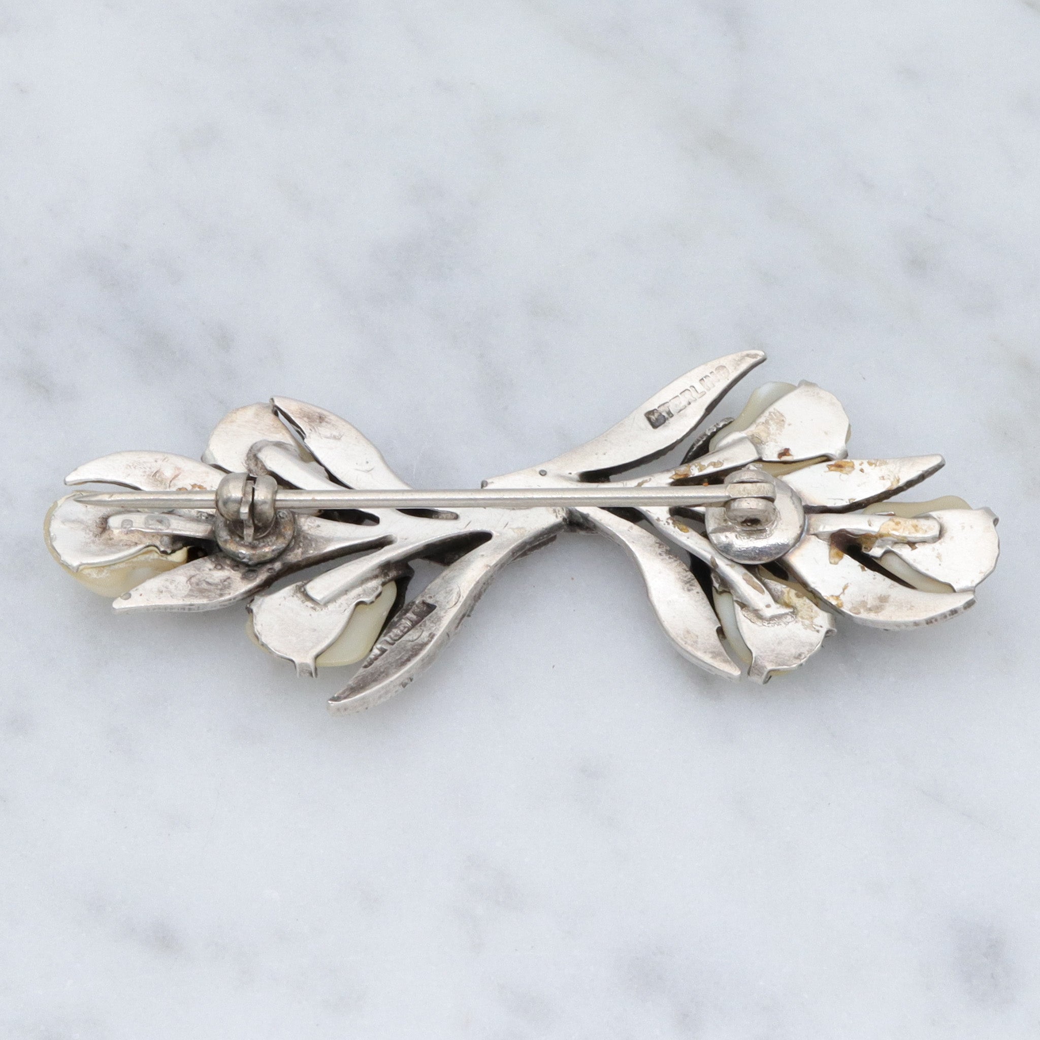 Antique Art Deco sterling, baby tooth pearl & marcasite floral spray brooch