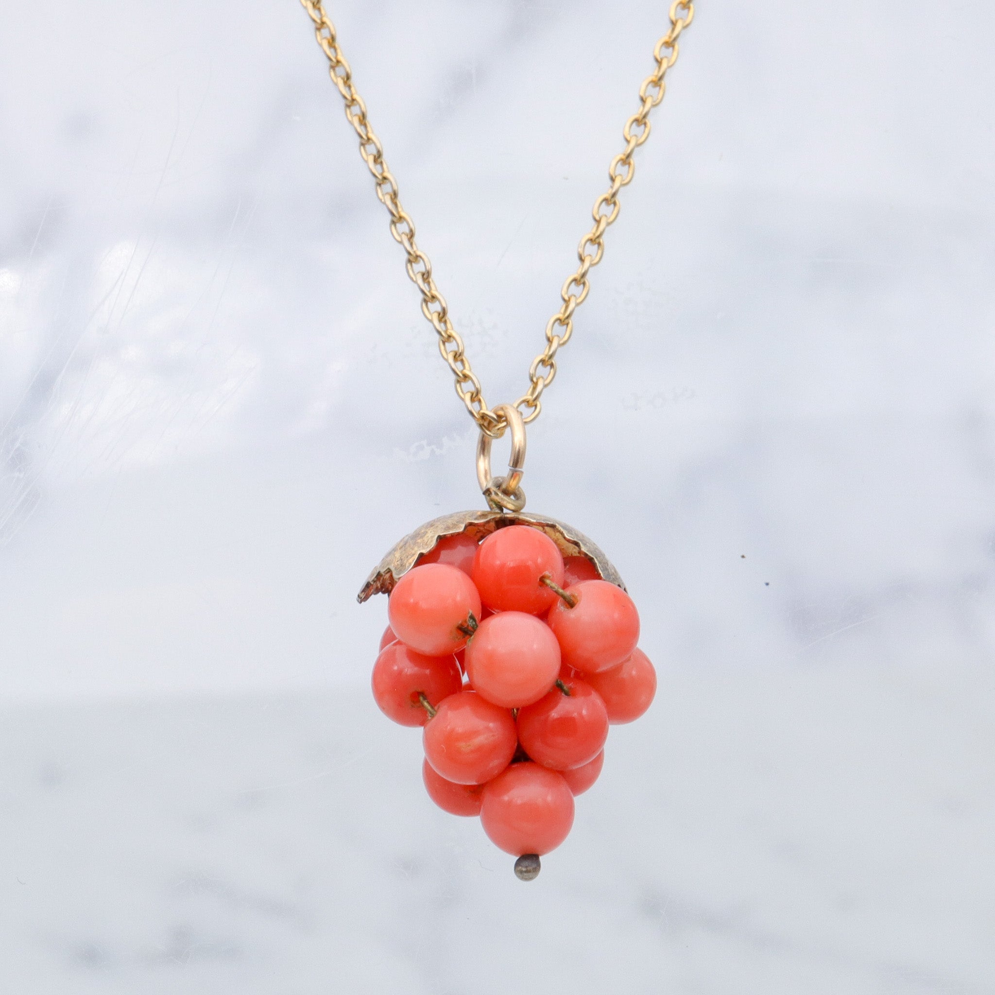 Antique gilt metal coral bead grape bunch pendant