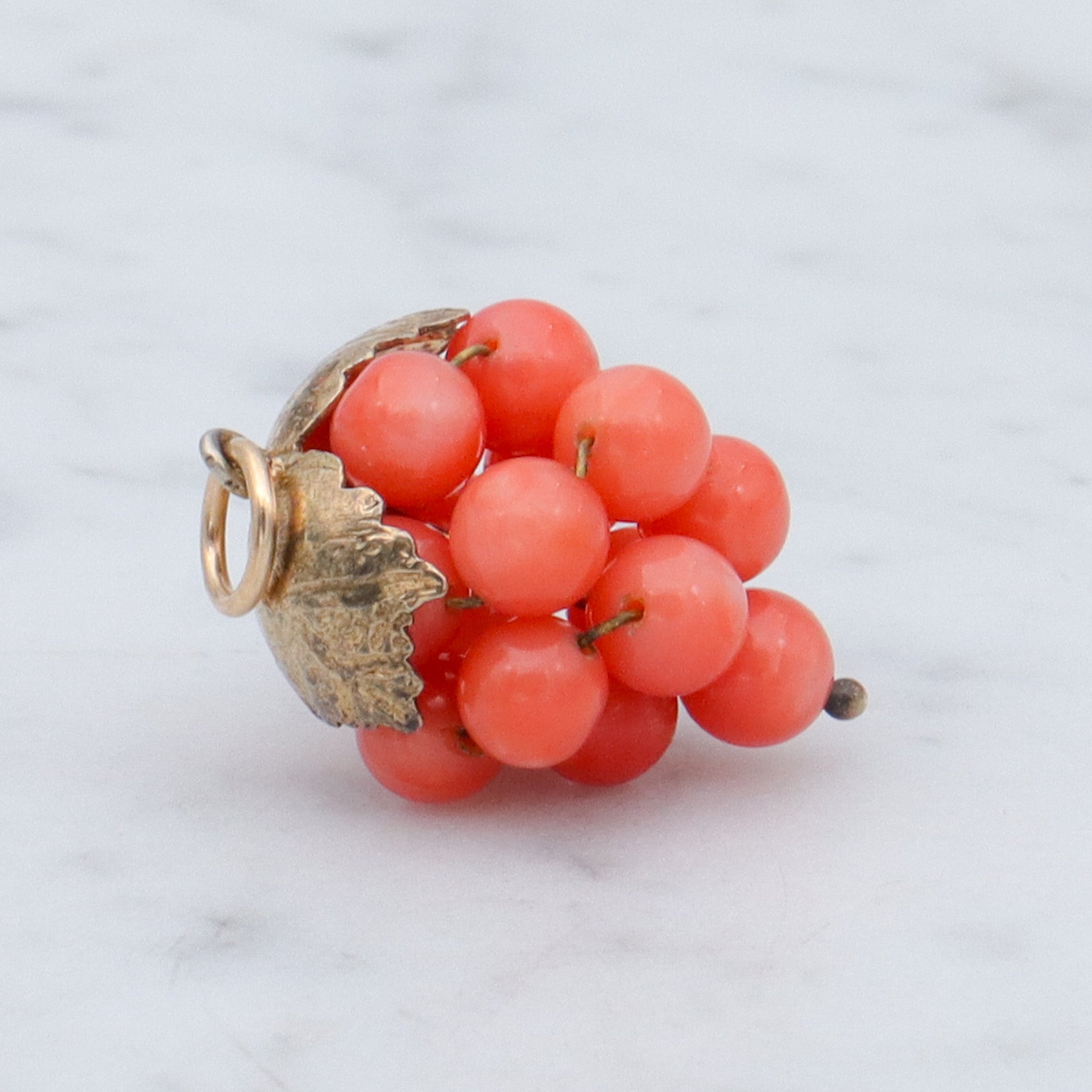 Antique gilt metal coral bead grape bunch pendant