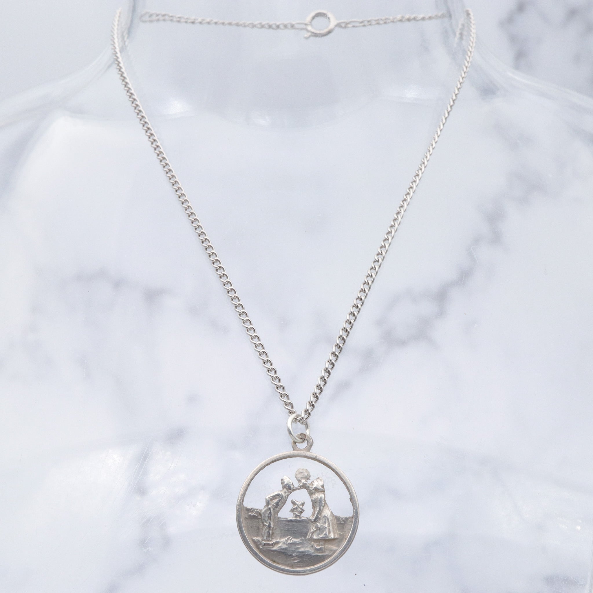 Vintage Dutch .800 silver cutout courting couple charm pendant