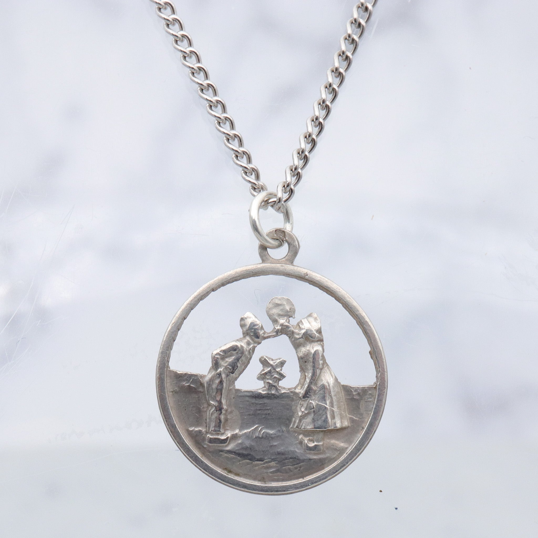 Vintage Dutch .800 silver cutout courting couple charm pendant