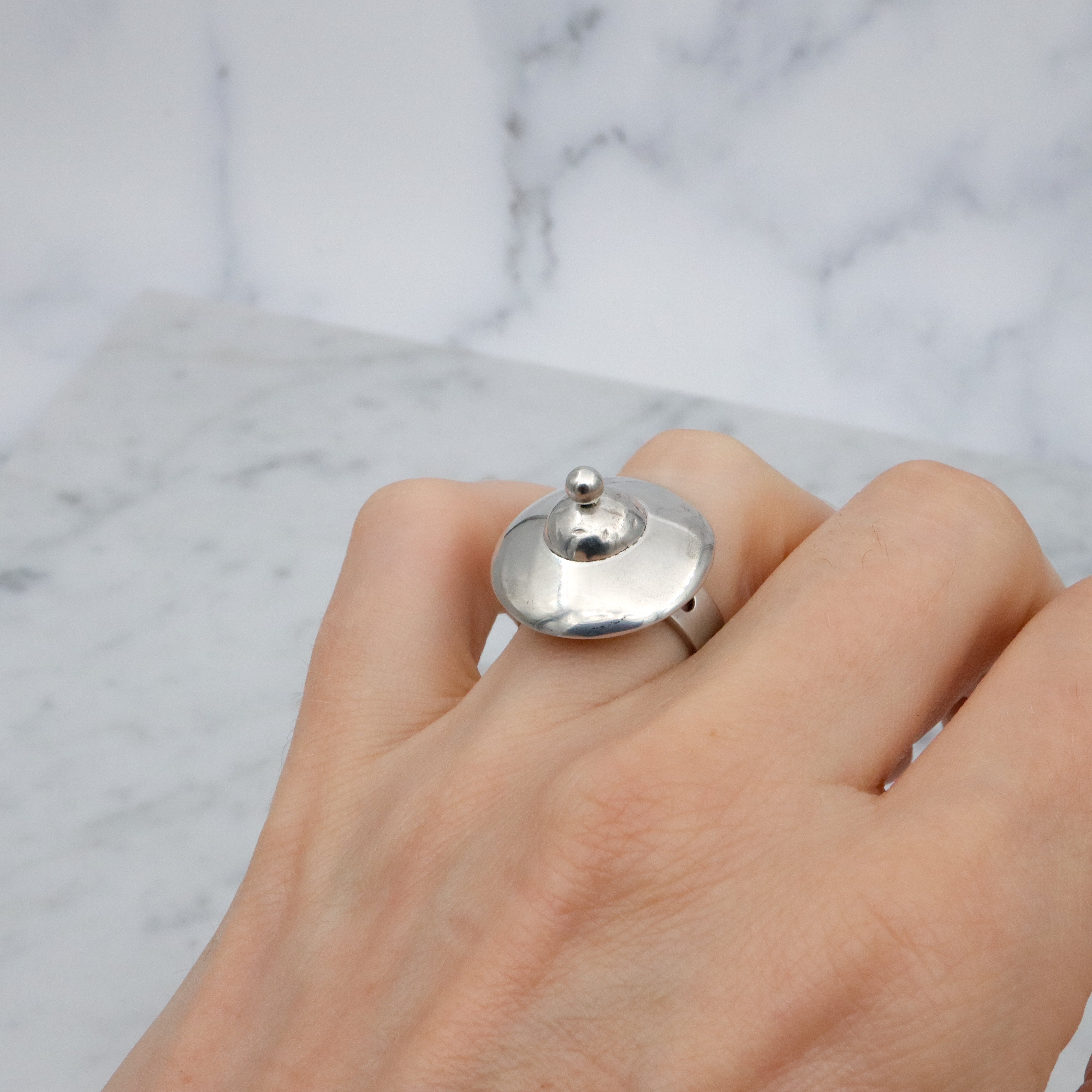 Modernist sculptural sterling disc ring, size 7