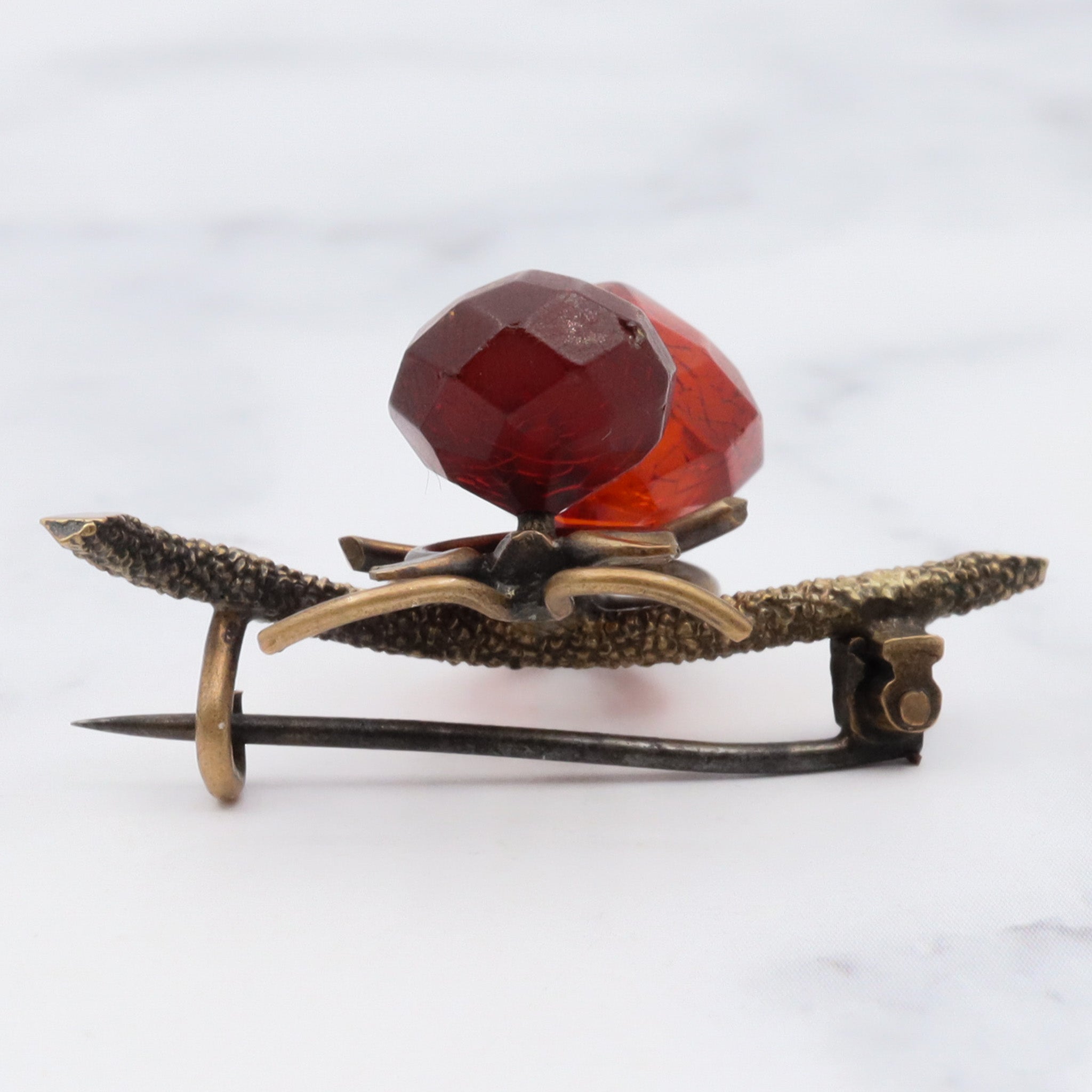 Antique brass and faceted amber large insect brooch