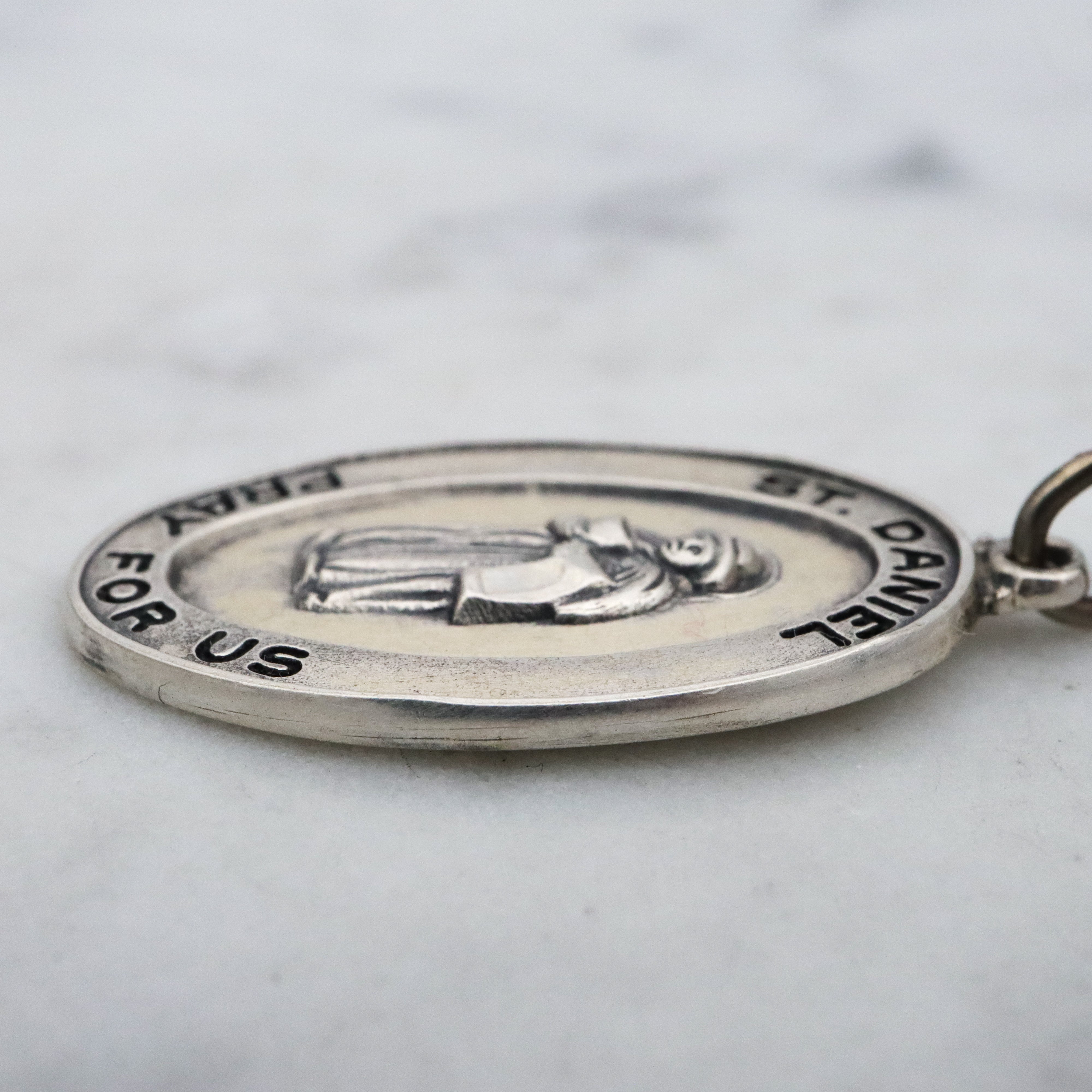 Vintage Creed sterling Saint Daniel medal pendant