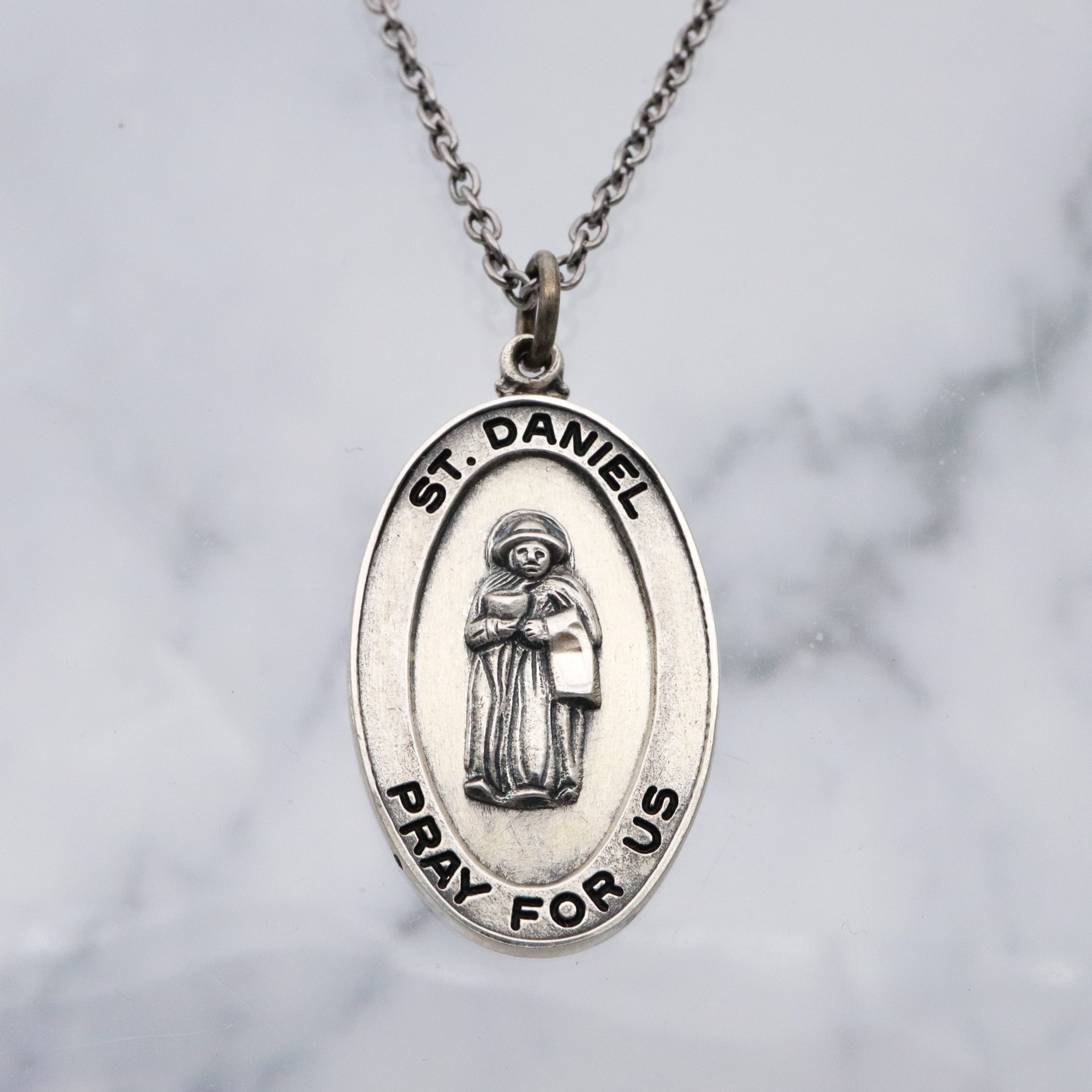 Vintage Creed sterling Saint Daniel medal pendant