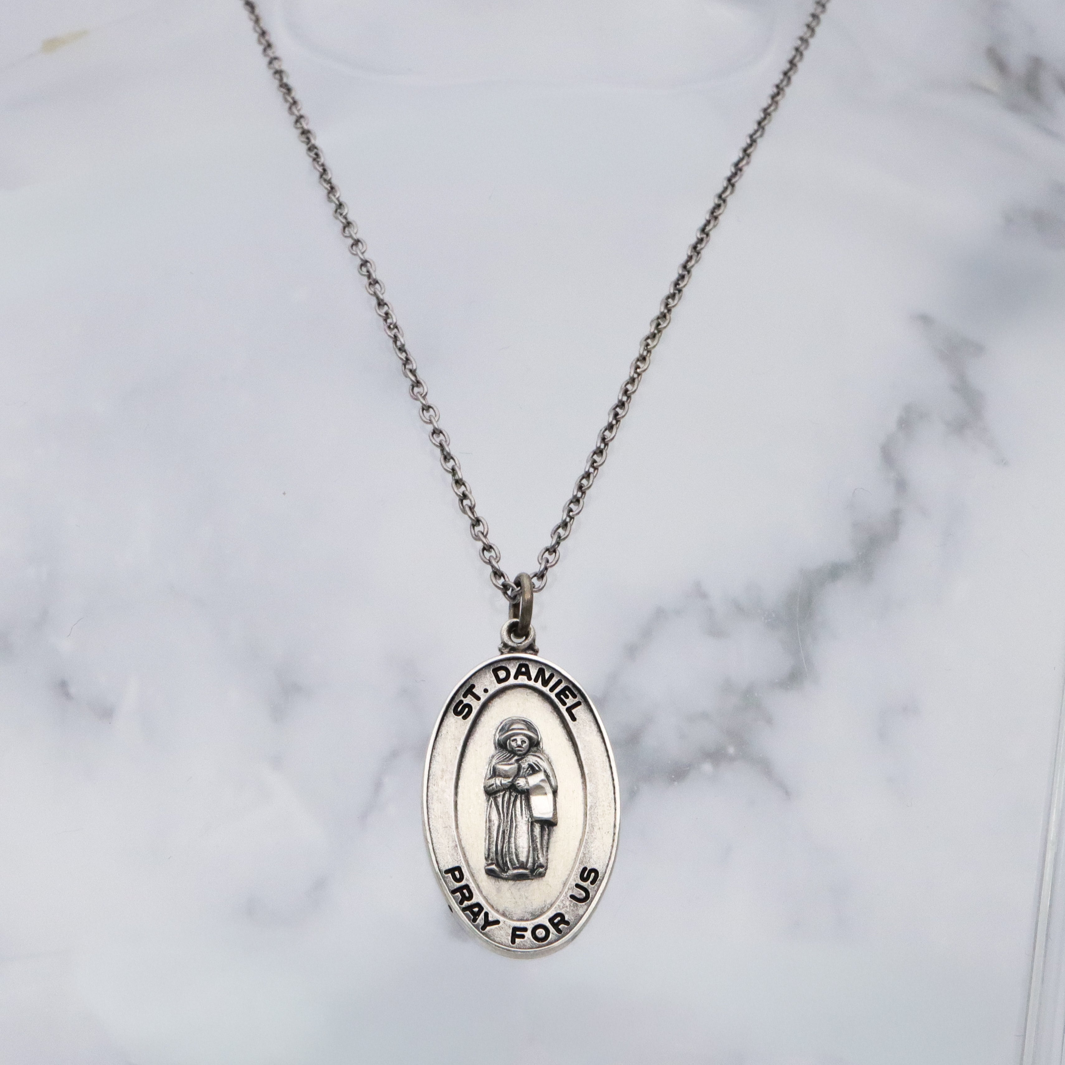 Vintage Creed sterling Saint Daniel medal pendant