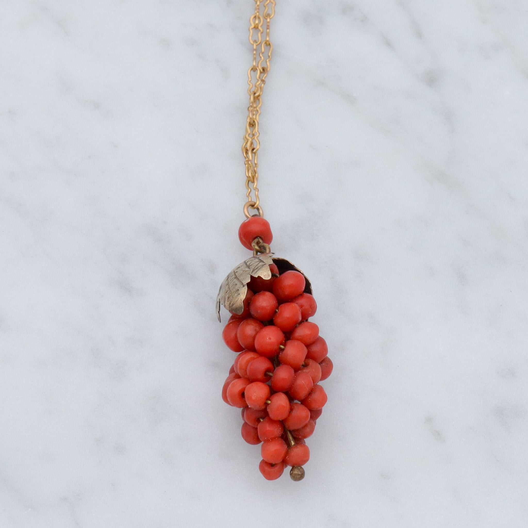 Antique Victorian gilt metal coral bead grape bunch pendant on gold filled crinkle chain