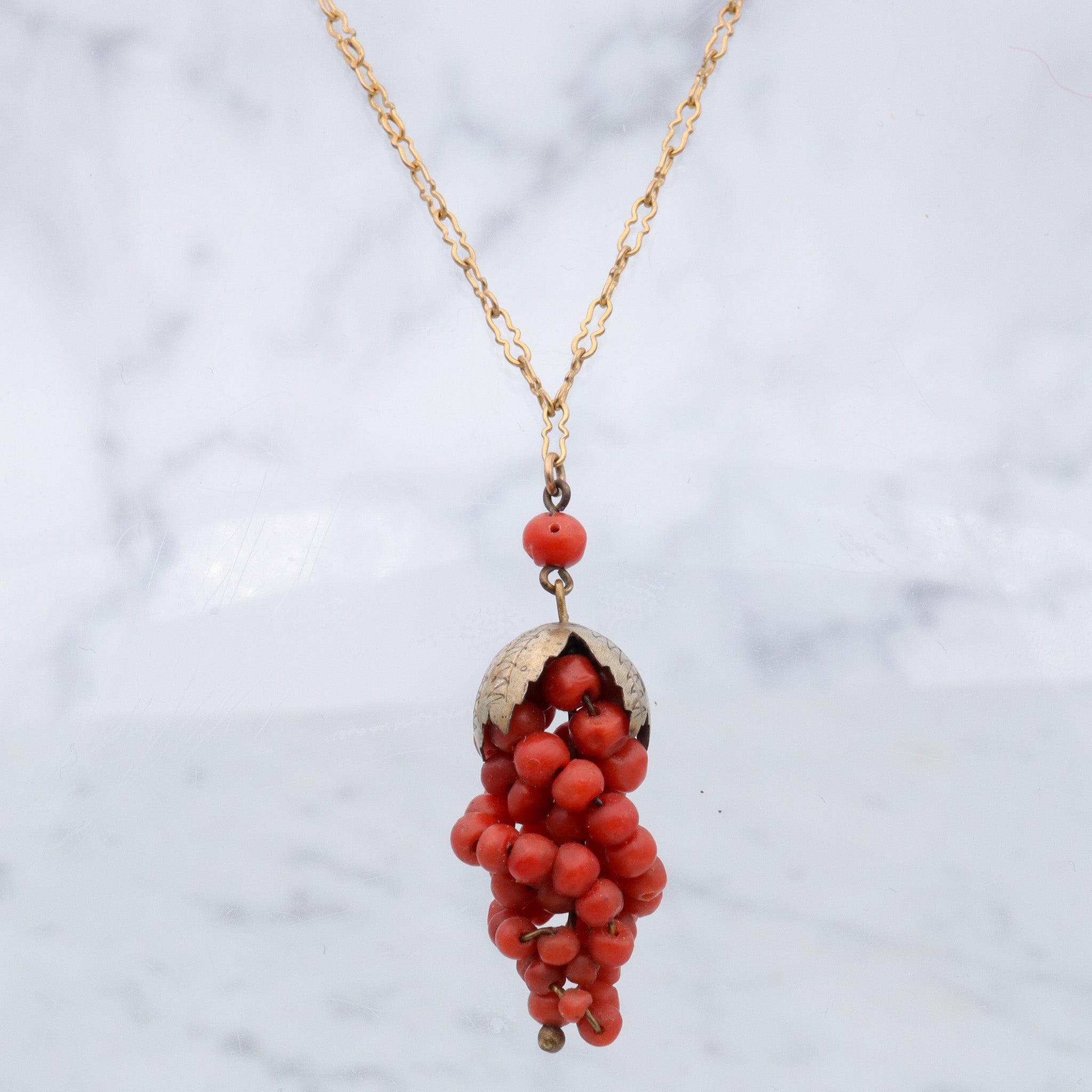 Antique Victorian gilt metal coral bead grape bunch pendant on gold filled crinkle chain
