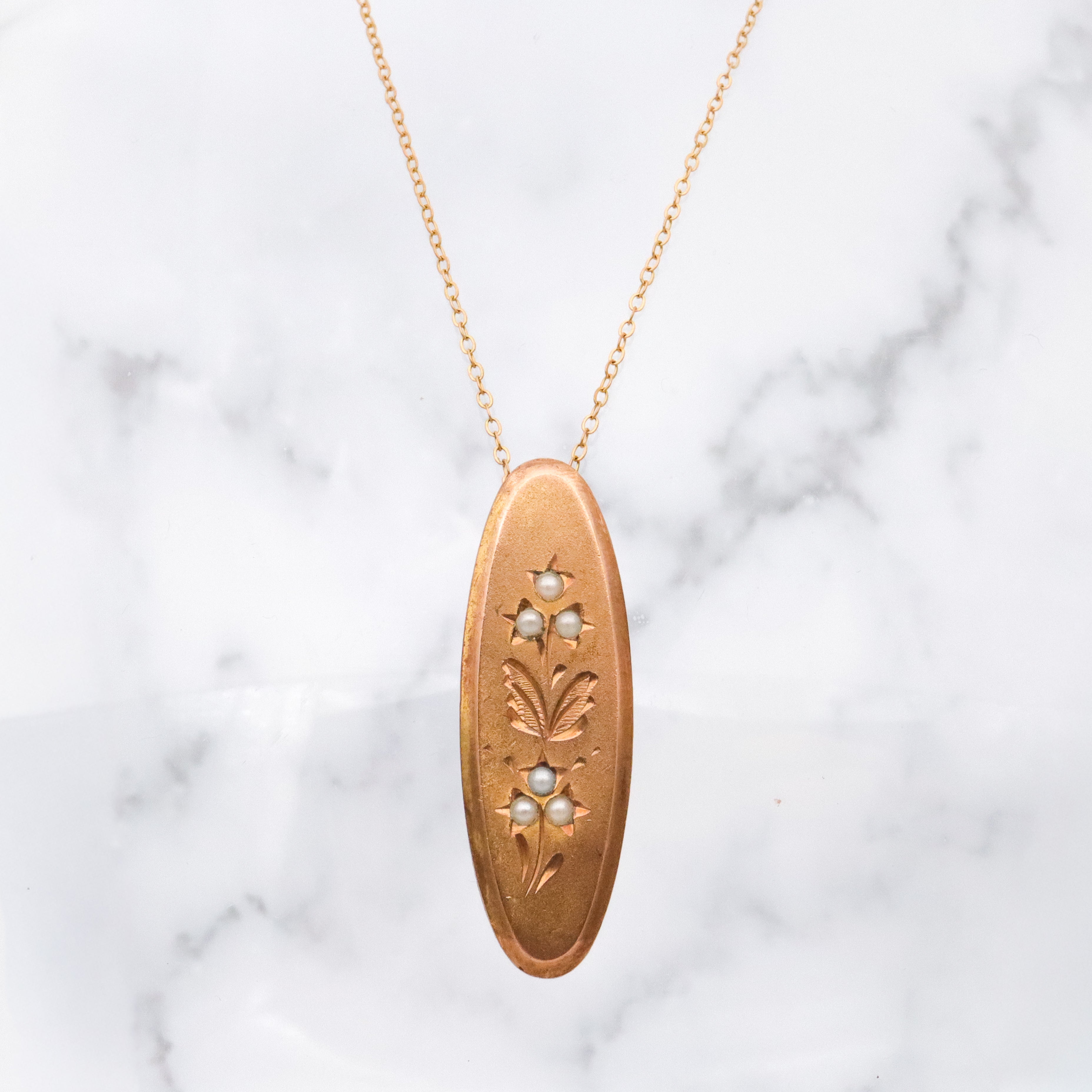 Antique gilt metal & pearl floral oval brooch