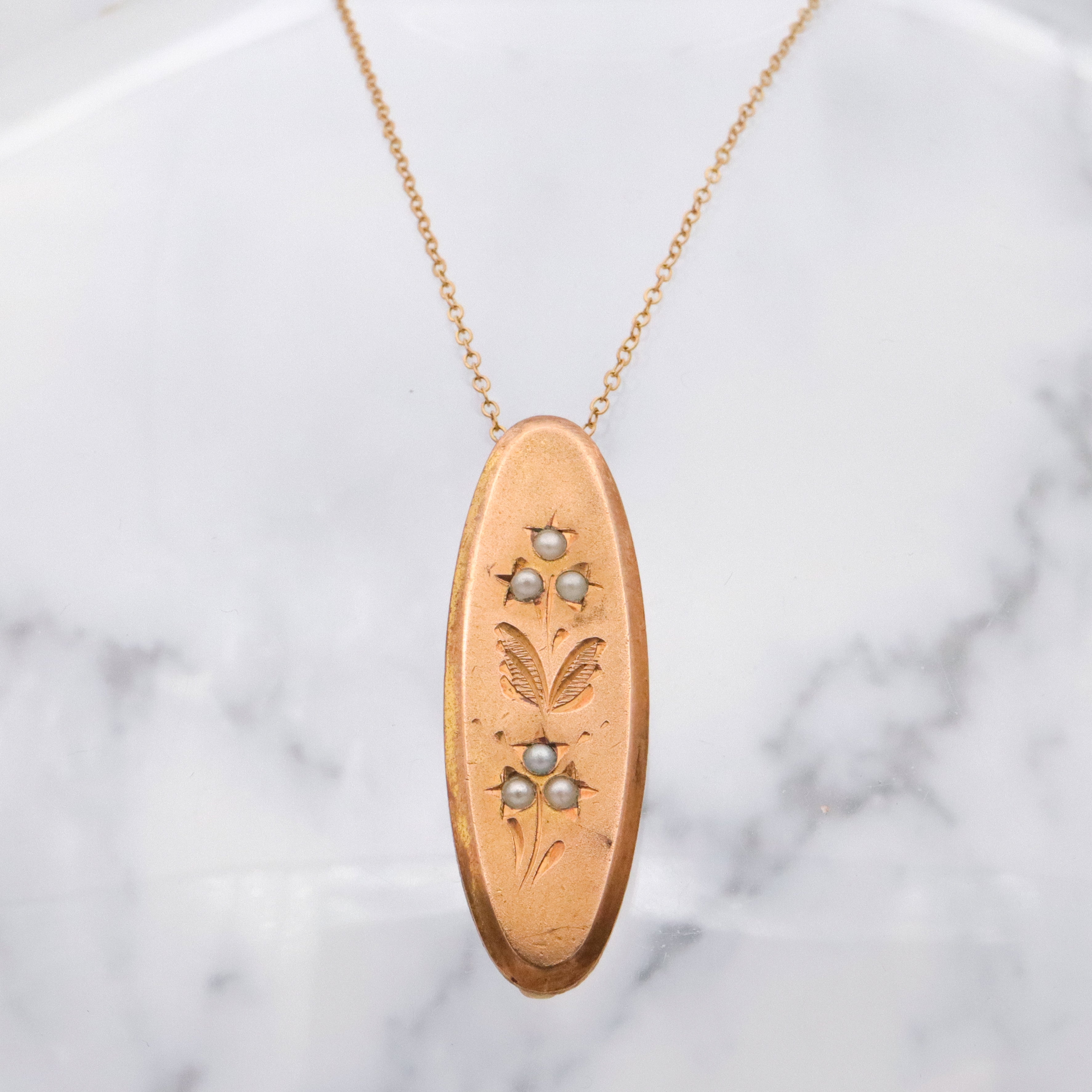 Antique gilt metal & pearl floral oval brooch