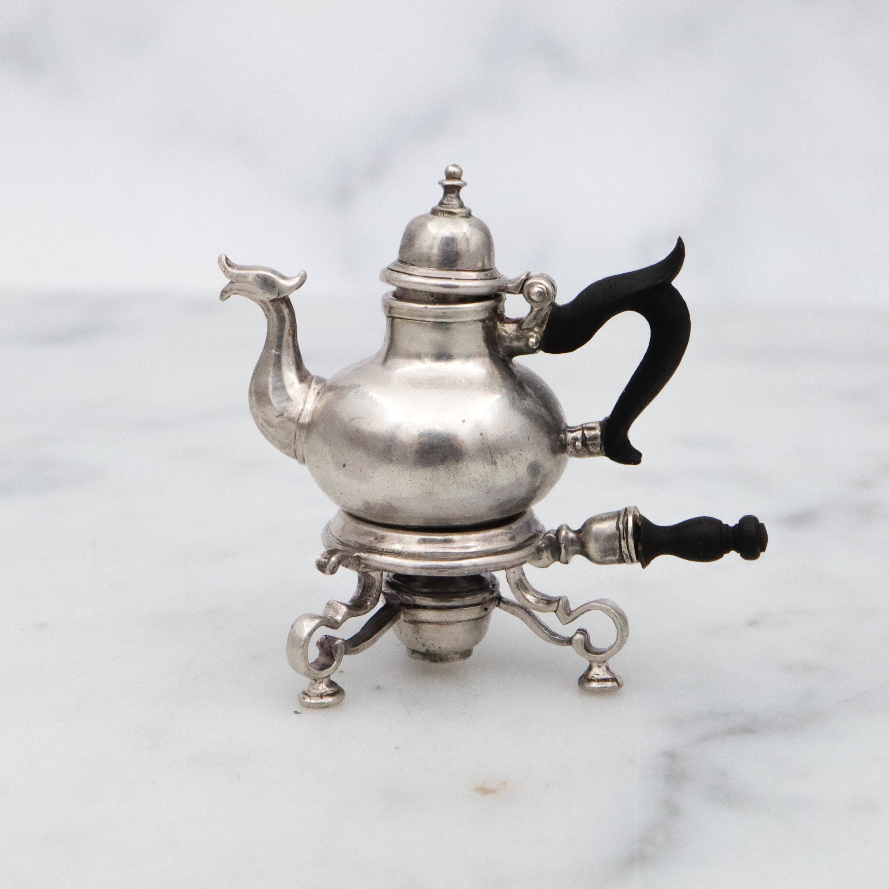 Vintage Obadiah Fisher sterling & ebony miniature teapot and warming stand