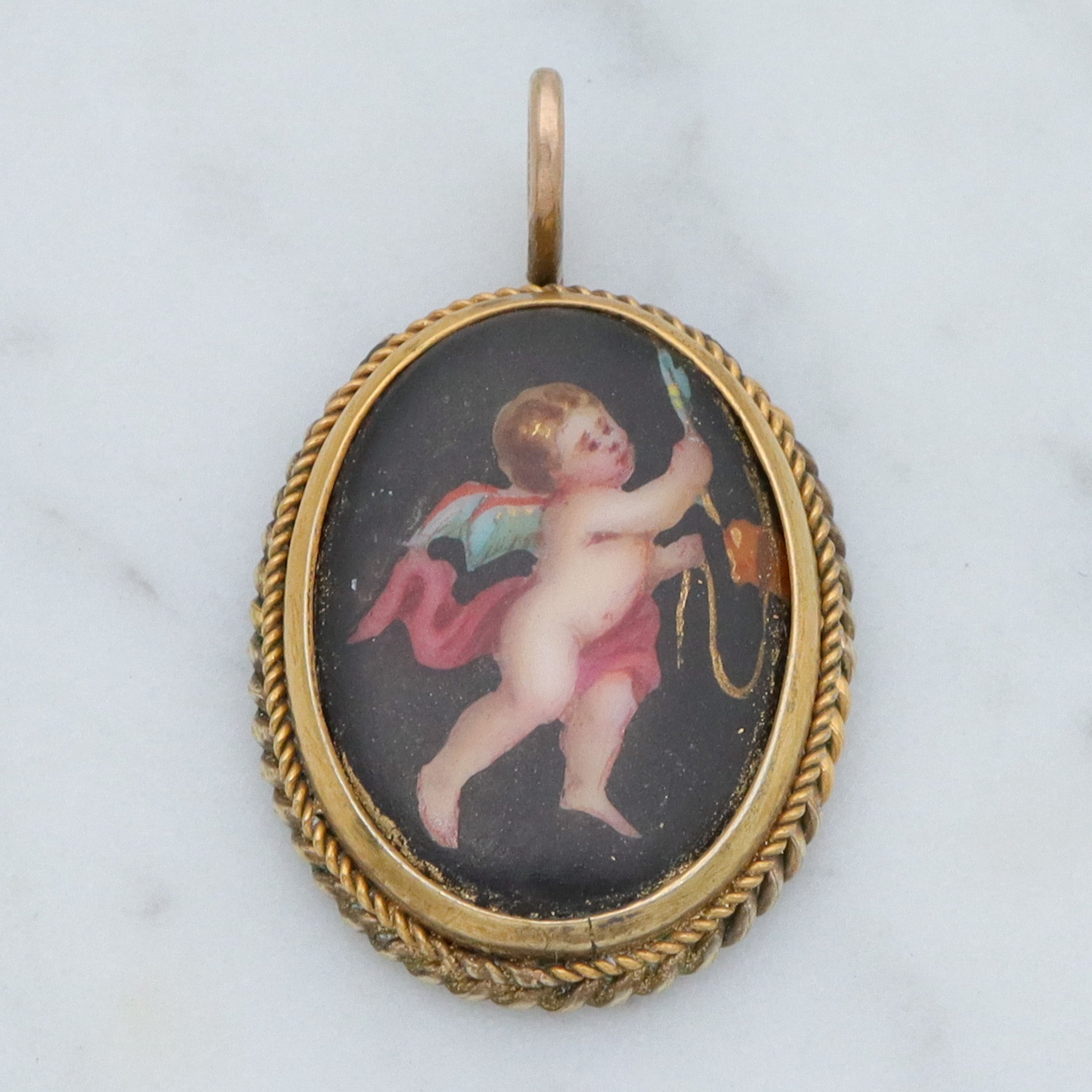 Antique Victorian hand painted winged cherub gilt metal pendant