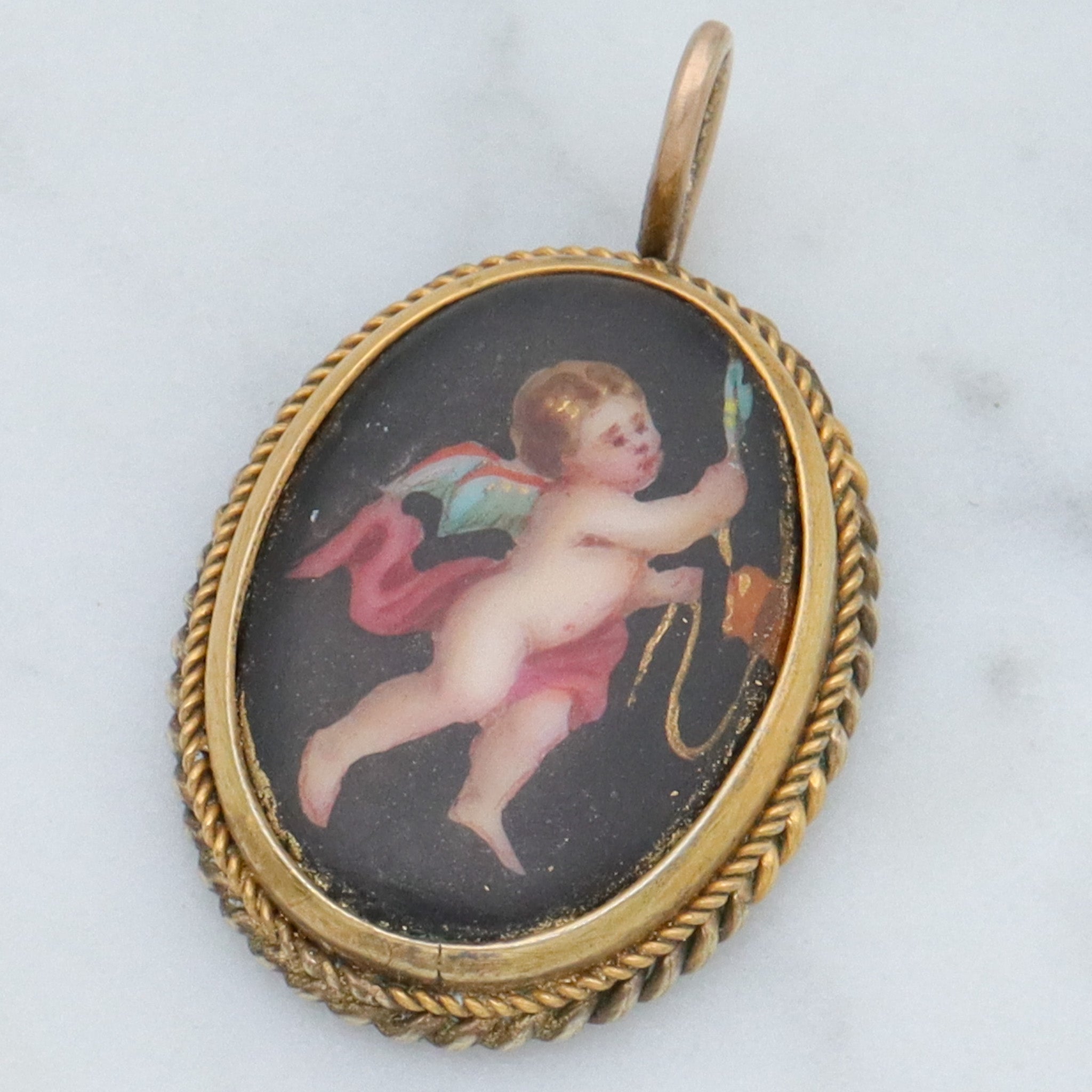 Antique Victorian hand painted winged cherub gilt metal pendant