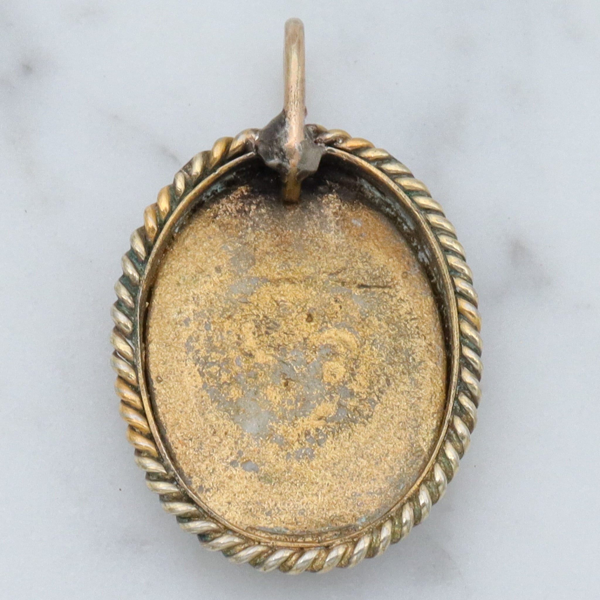 Antique Victorian hand painted winged cherub gilt metal pendant