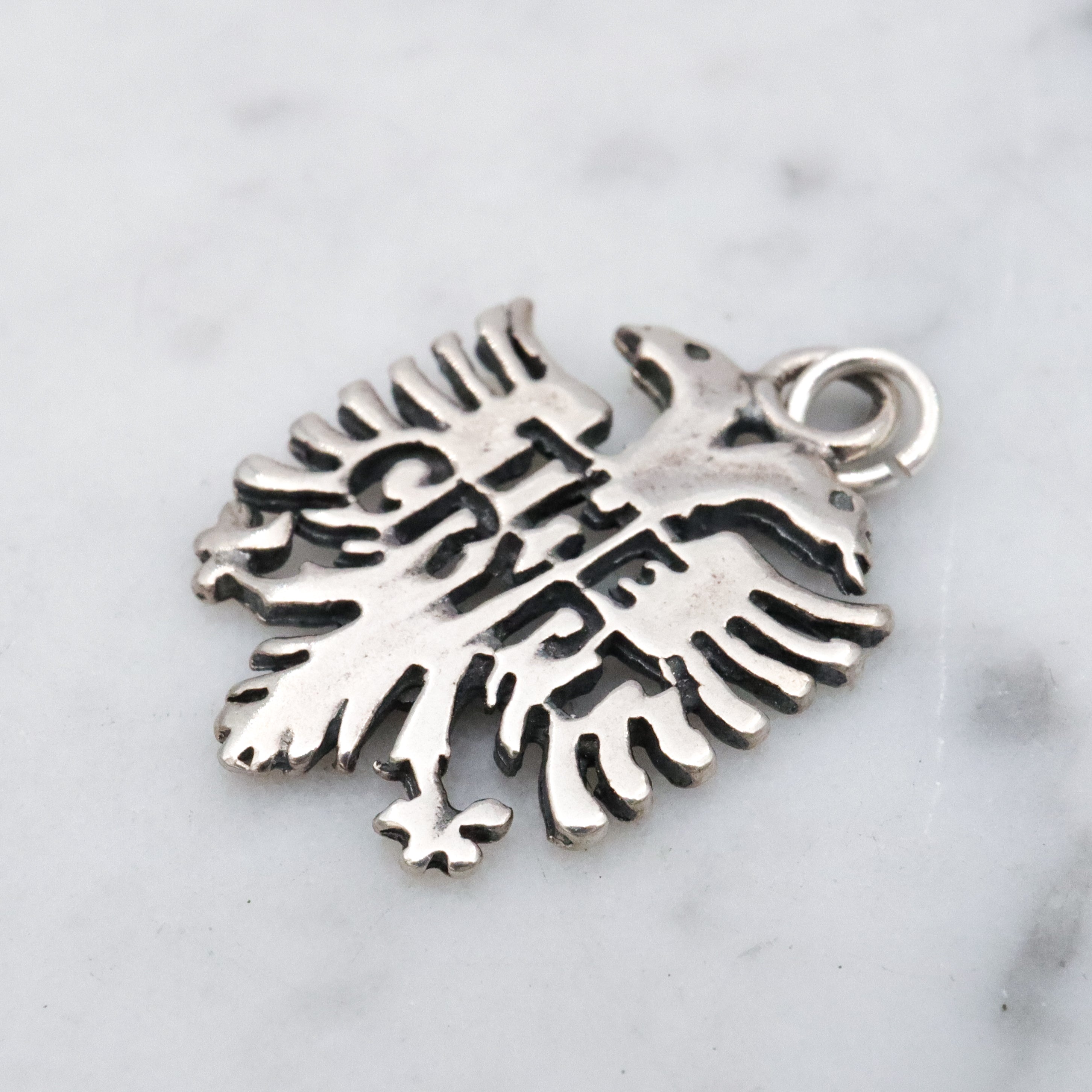 Vintage sterling "The Crypt" Seattle double headed eagle pendant