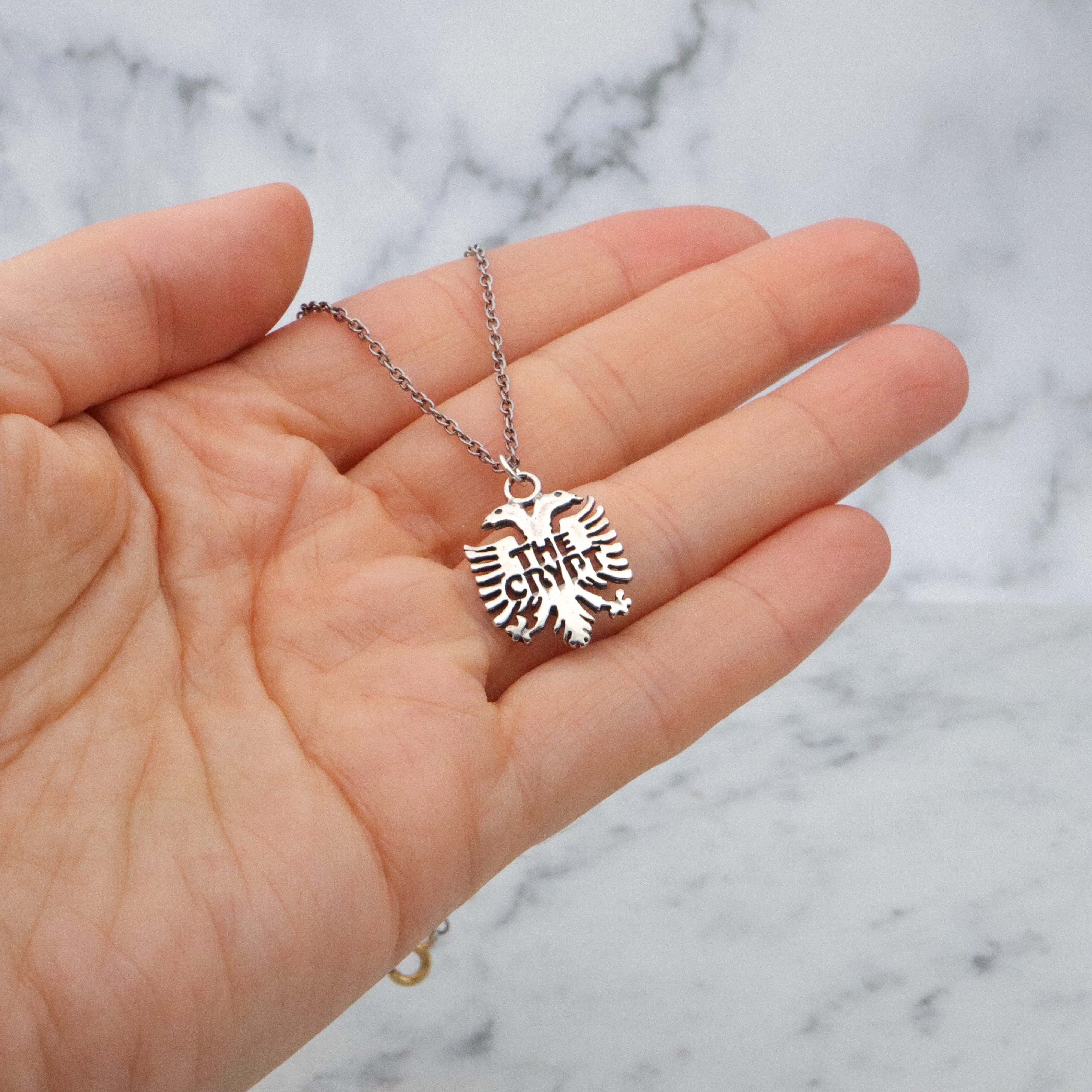 Vintage sterling "The Crypt" Seattle double headed eagle pendant