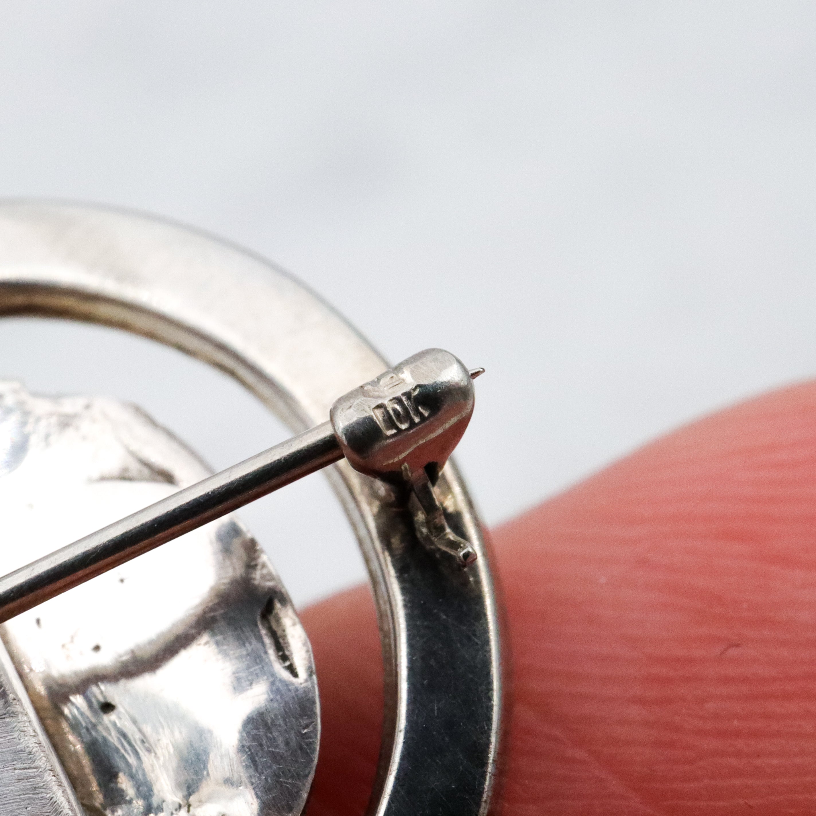 Antique Art Deco 10k white gold & sterling dog circle pin