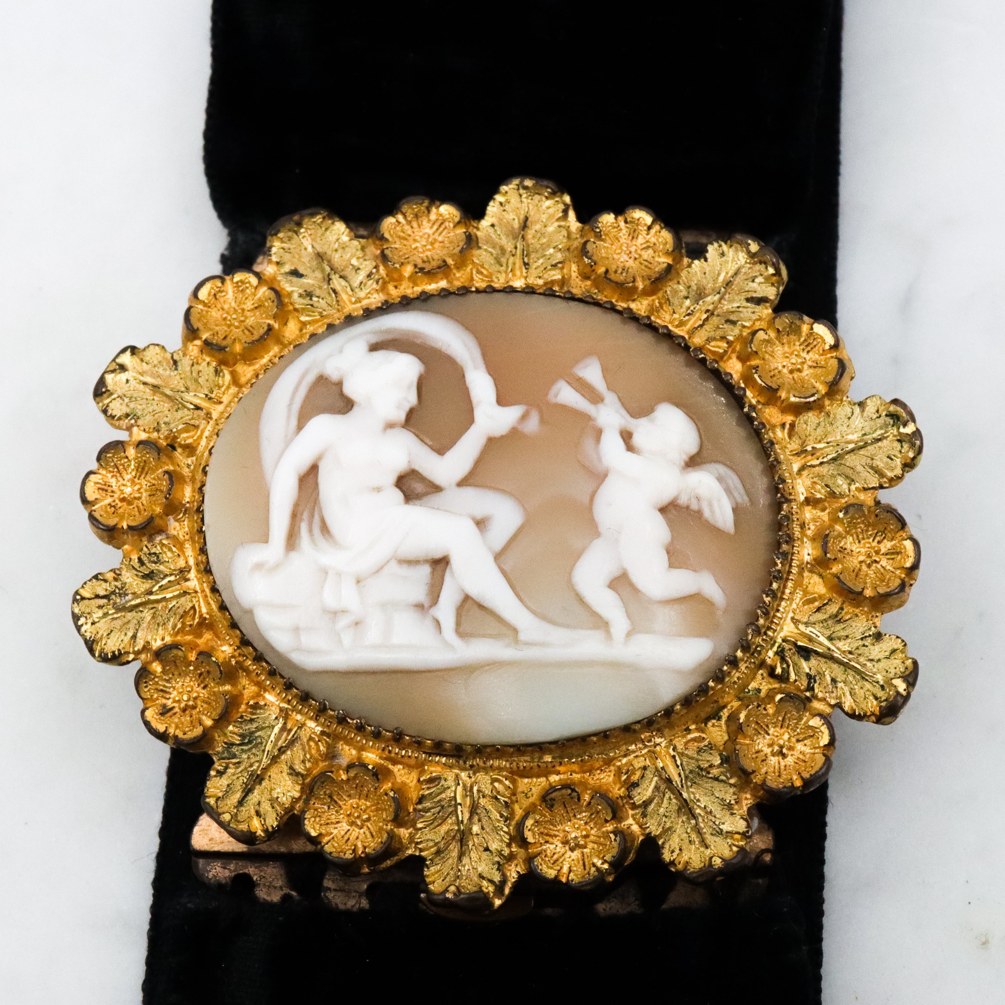 Antique Victorian Venus & Cupid gilt metal foliate framed cameo with velvet ribbon bracelet