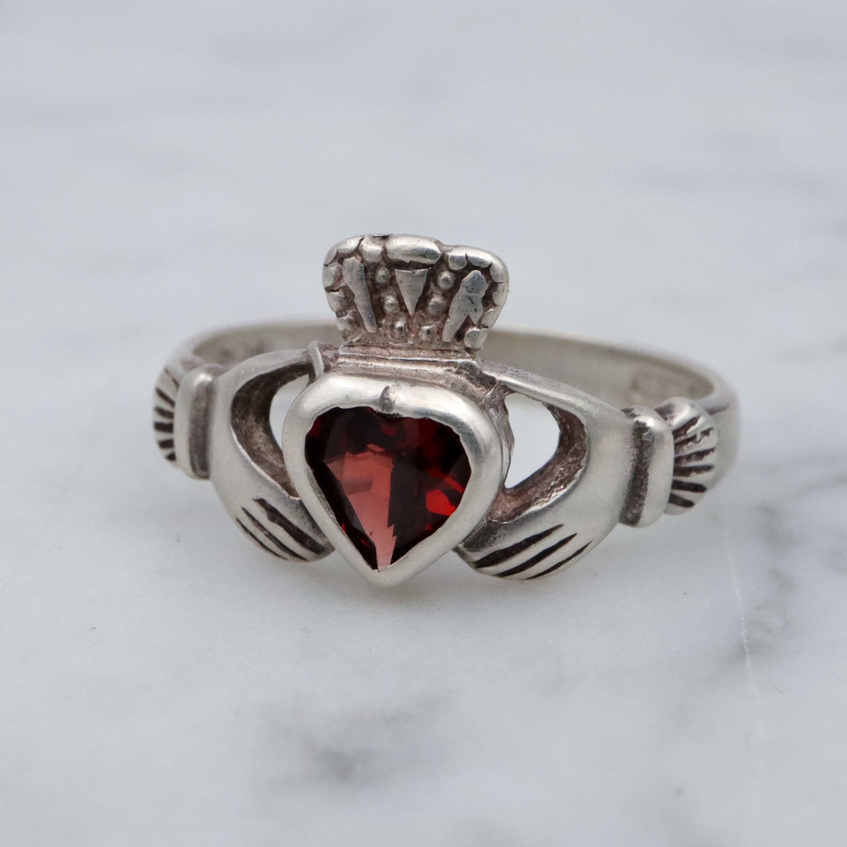 Vintage Irish sterling garnet Claddagh ring, size 7.25