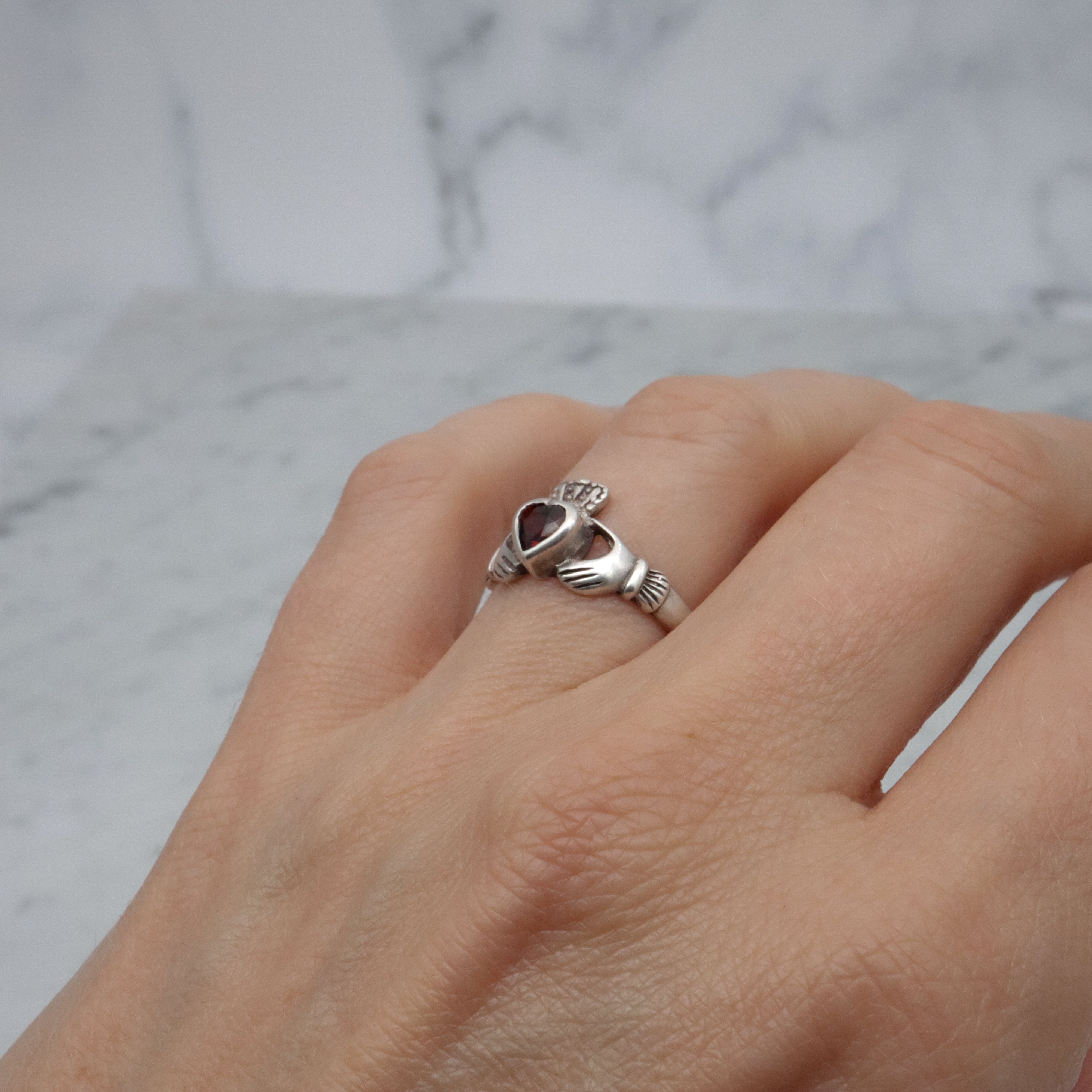 Vintage Irish sterling garnet Claddagh ring, size 7.25