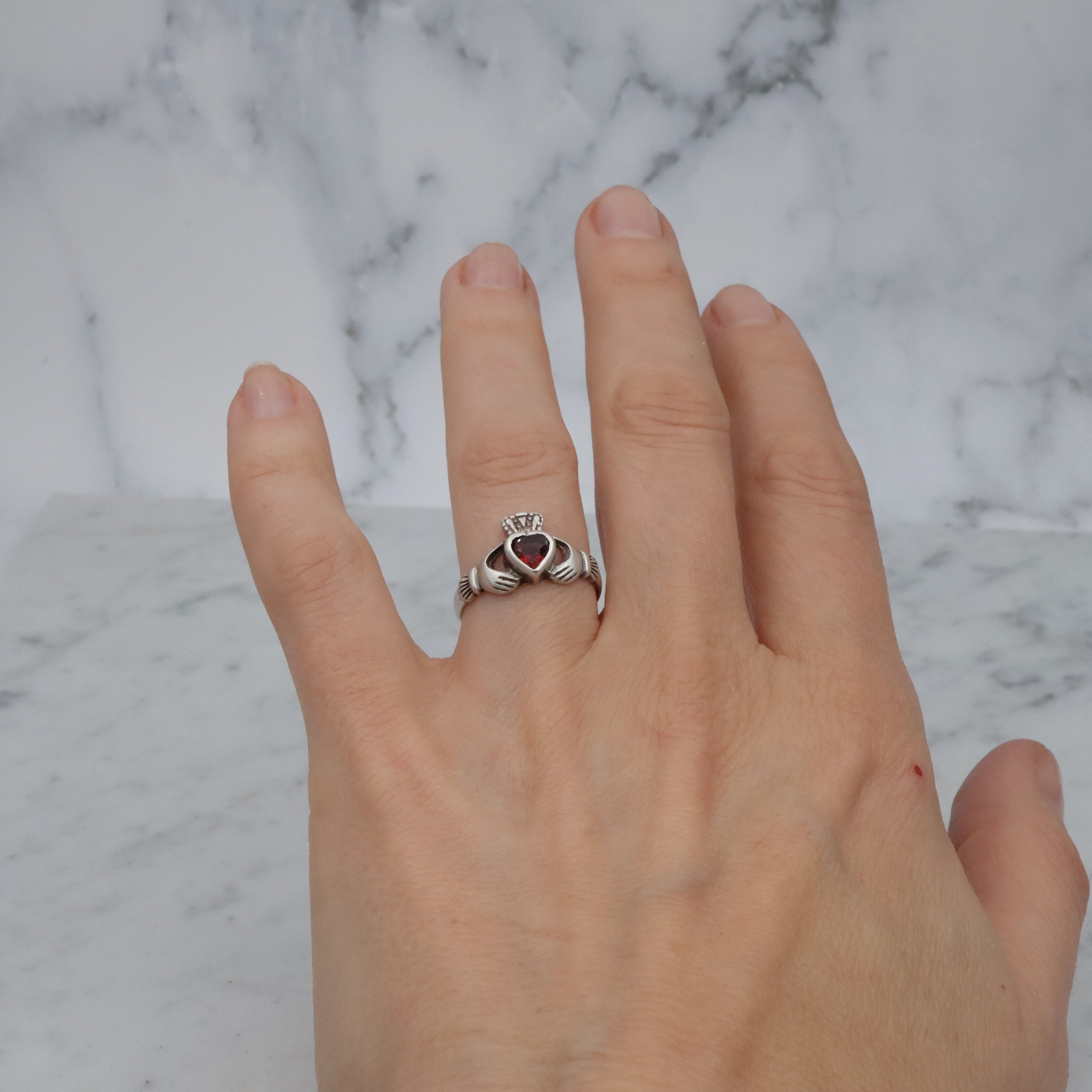 Vintage Irish sterling garnet Claddagh ring, size 7.25