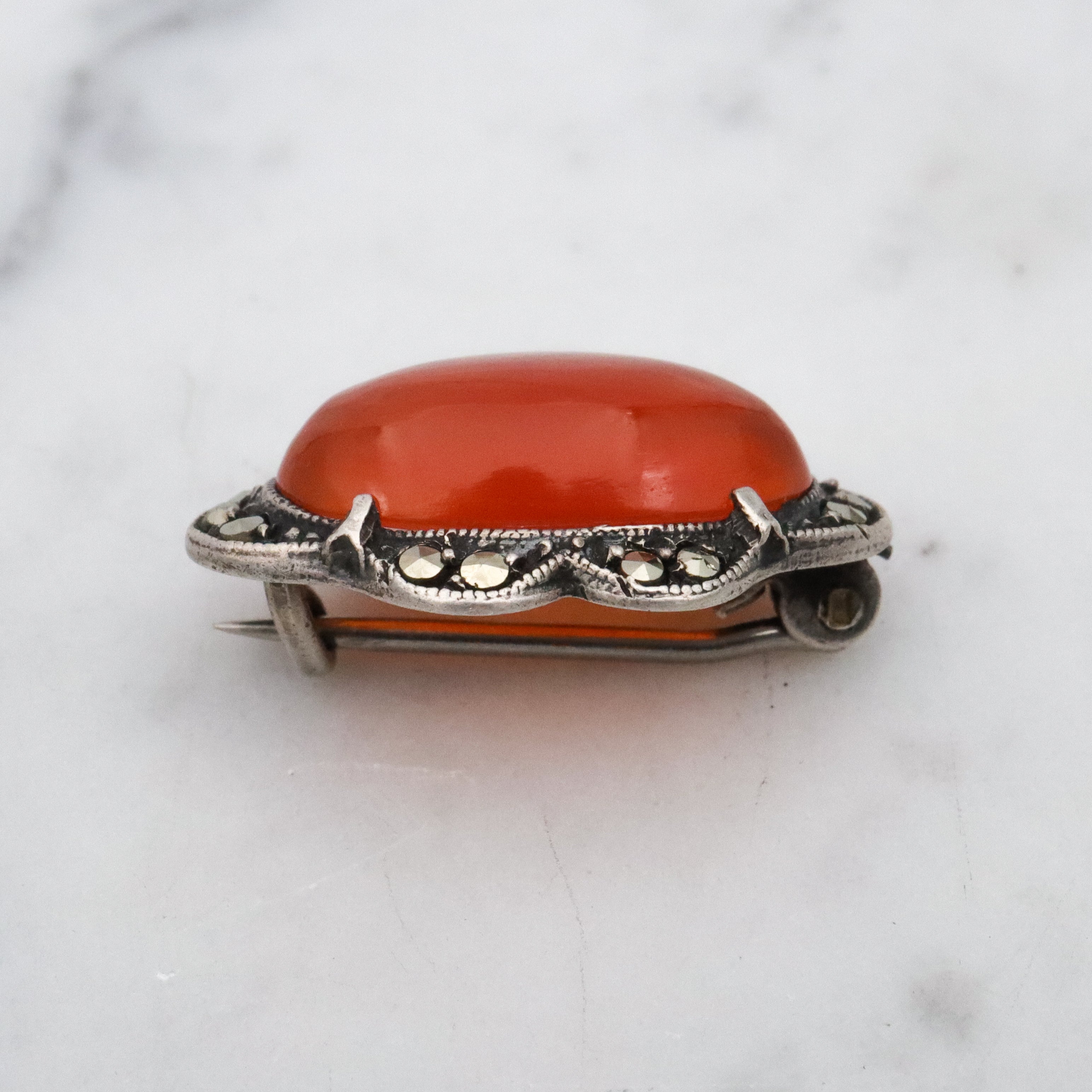 Antique Art Deco sterling carnelian & marcasite brooch