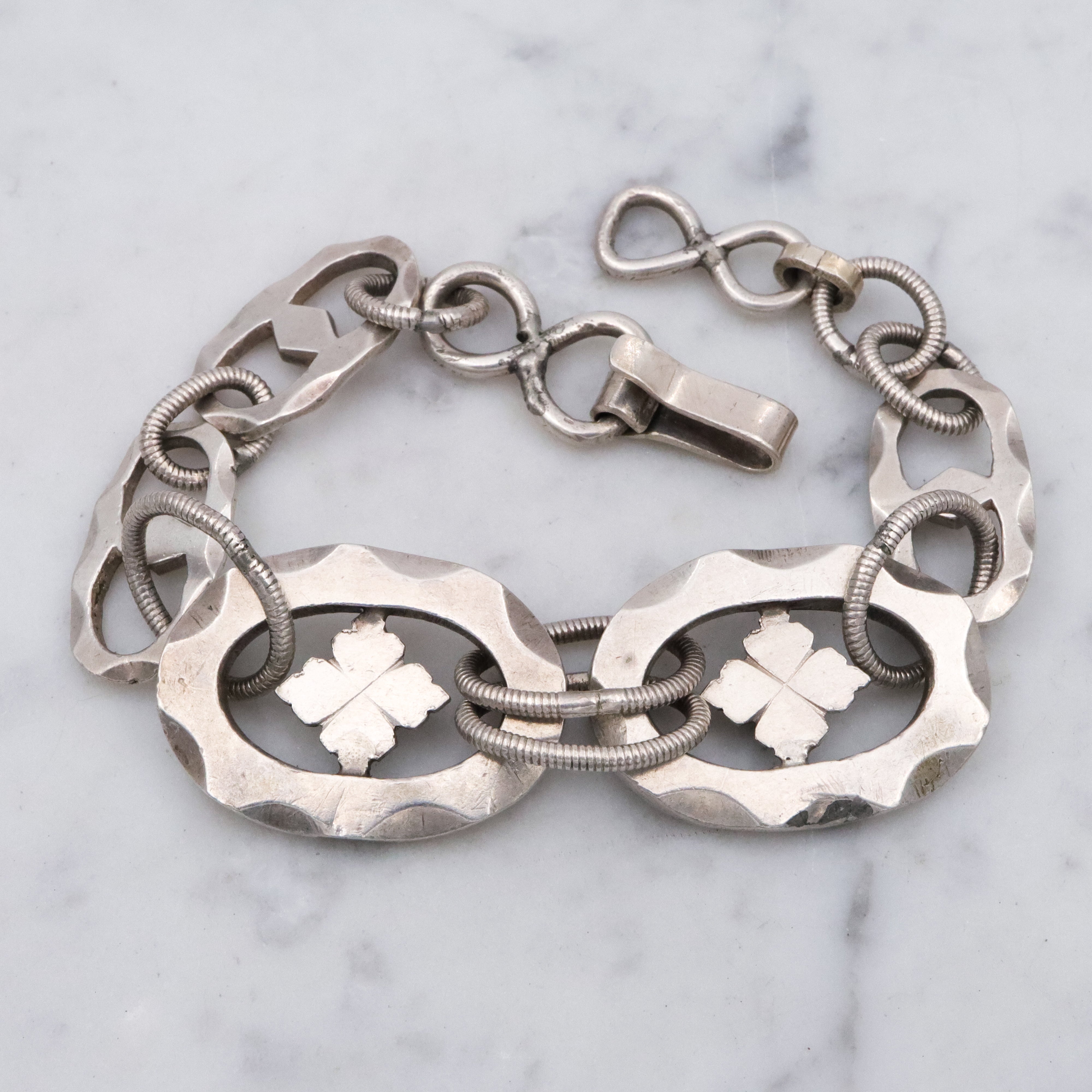 Mid Century hand wrought sterling hammered link clover motif bracelet