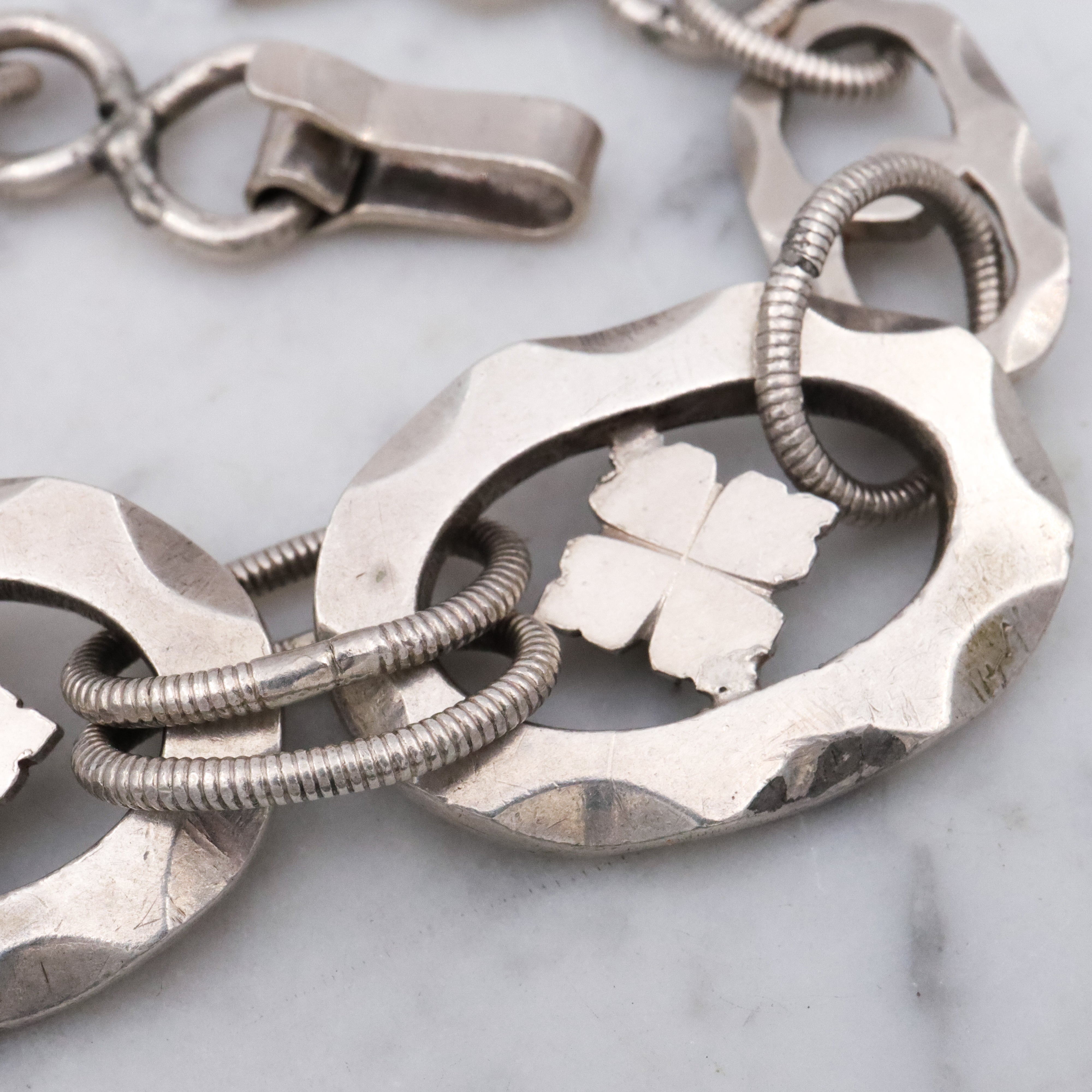 Mid Century hand wrought sterling hammered link clover motif bracelet