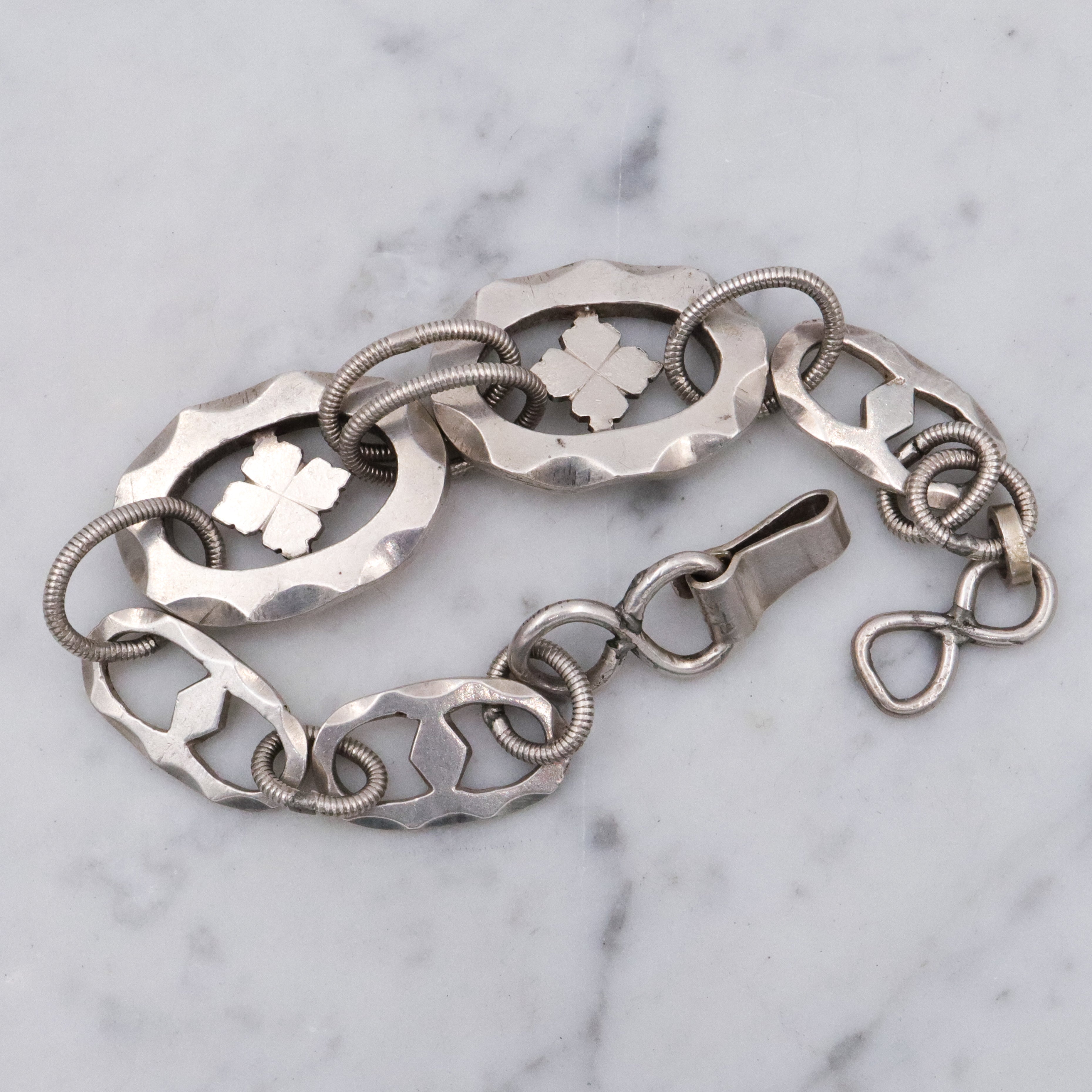Mid Century hand wrought sterling hammered link clover motif bracelet