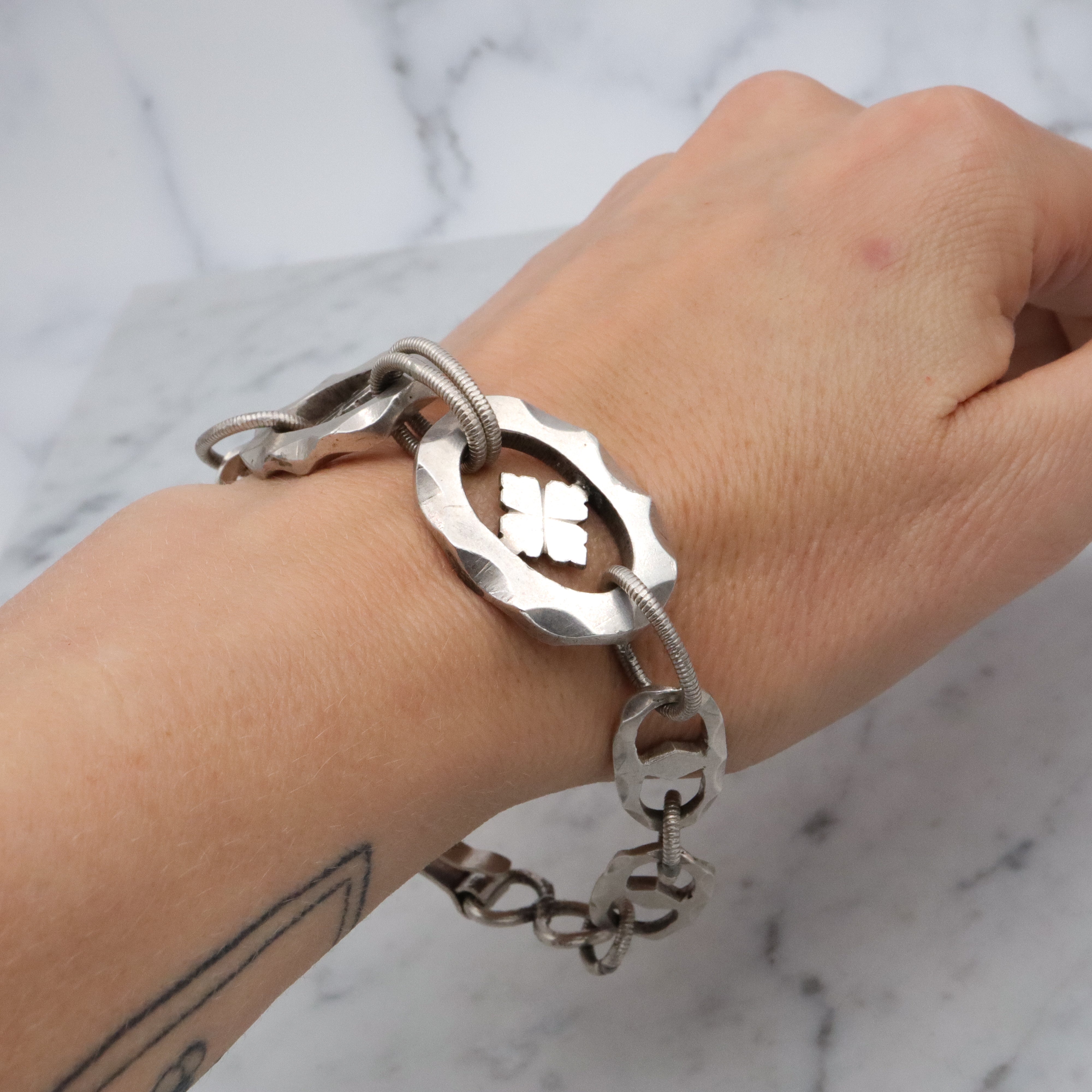 Mid Century hand wrought sterling hammered link clover motif bracelet