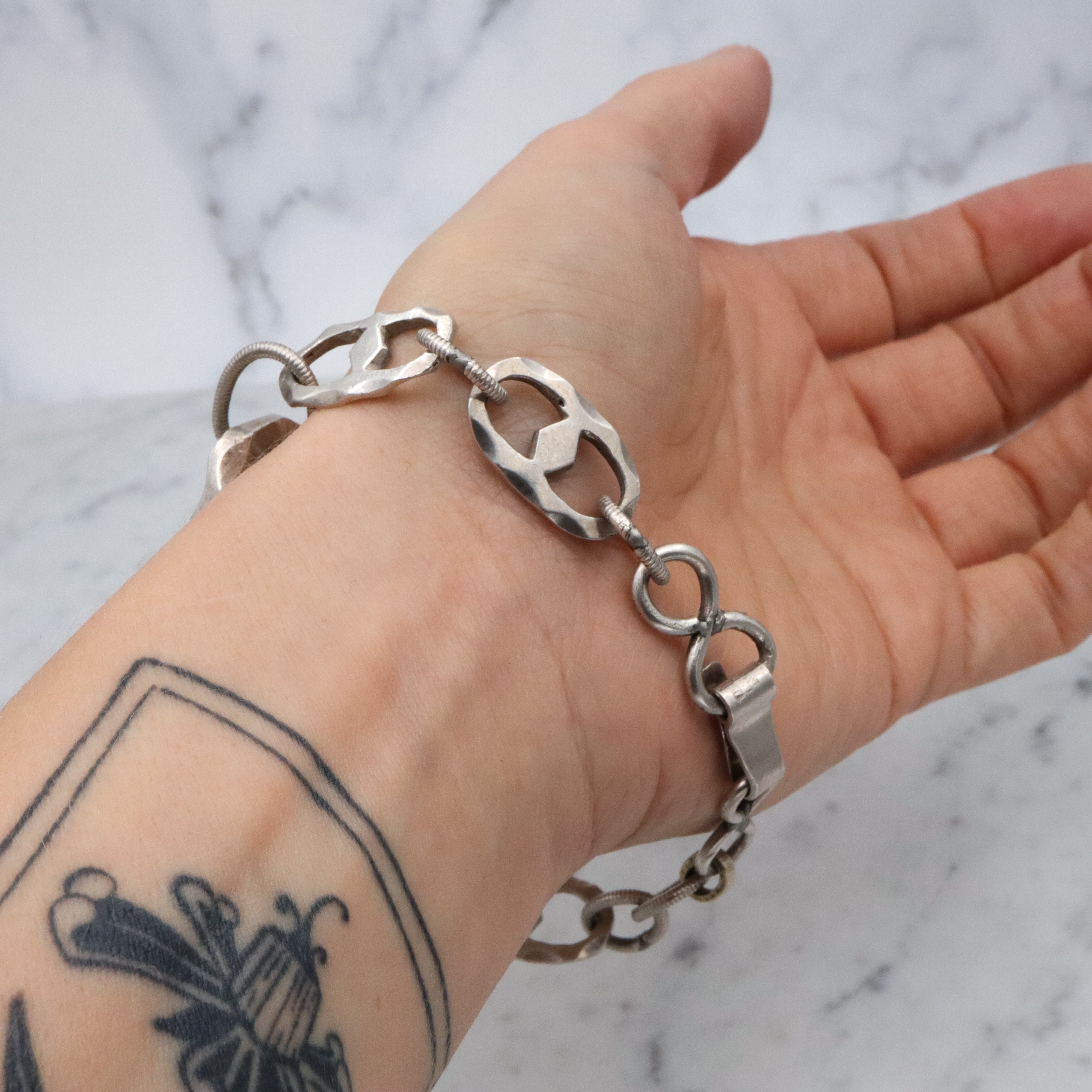 Mid Century hand wrought sterling hammered link clover motif bracelet
