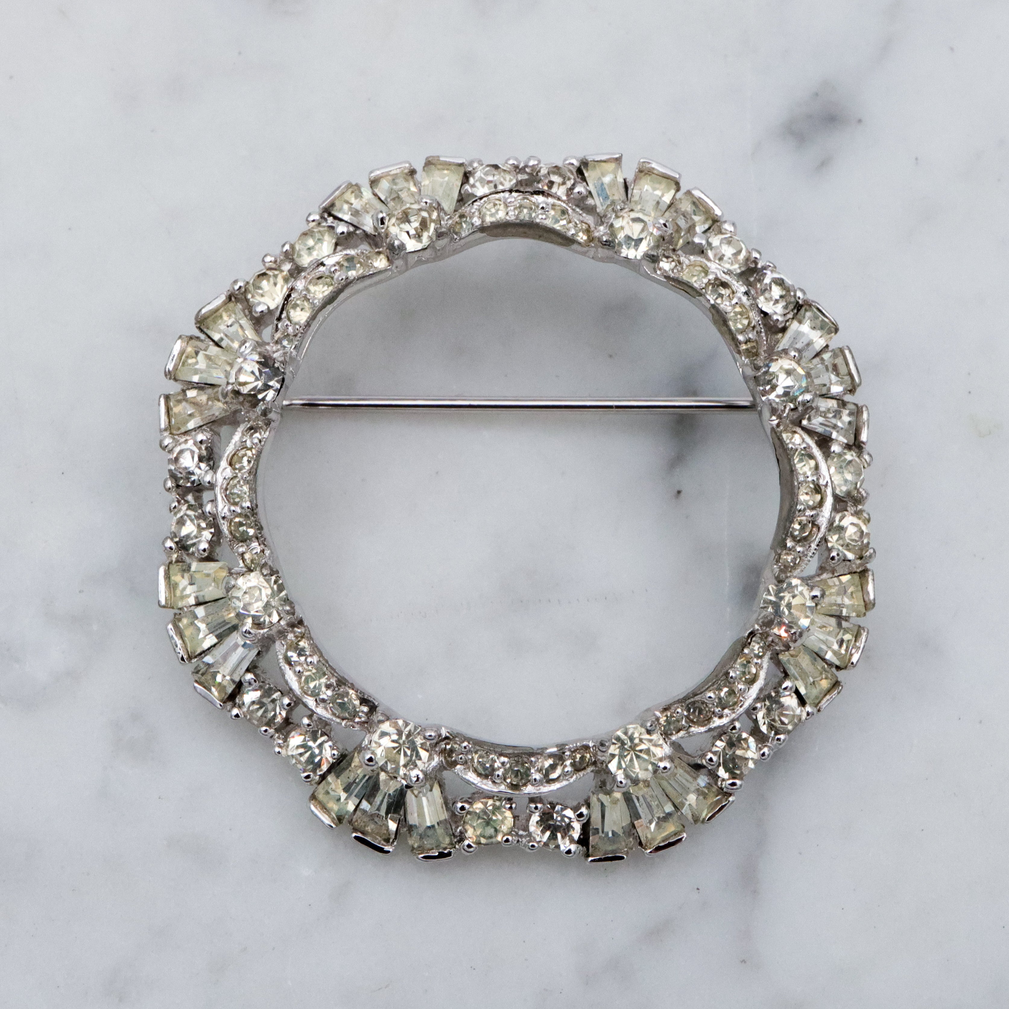 Art Deco Revival Jomaz rhodium plated rhinestone open wreath brooch