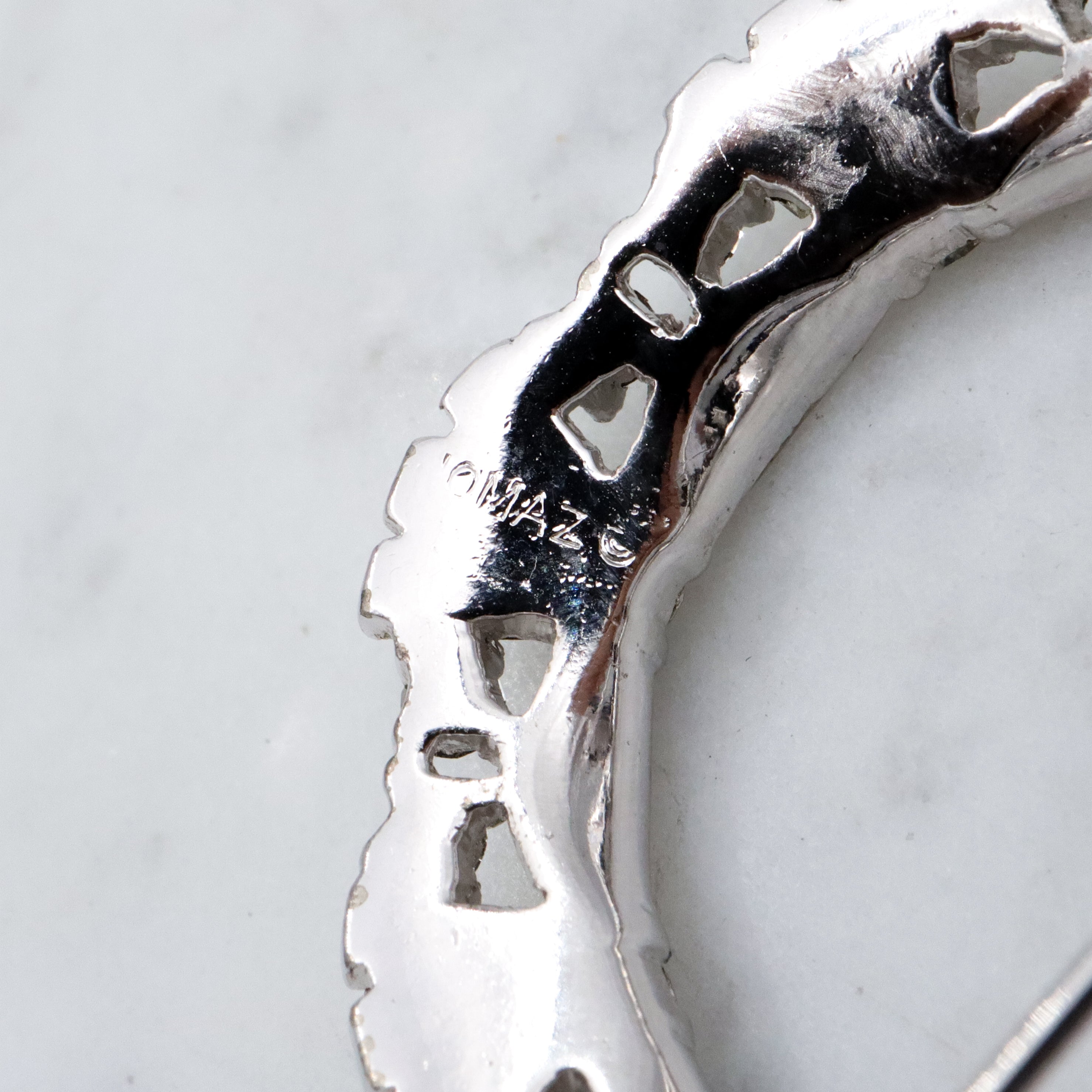 Art Deco Revival Jomaz rhodium plated rhinestone open wreath brooch