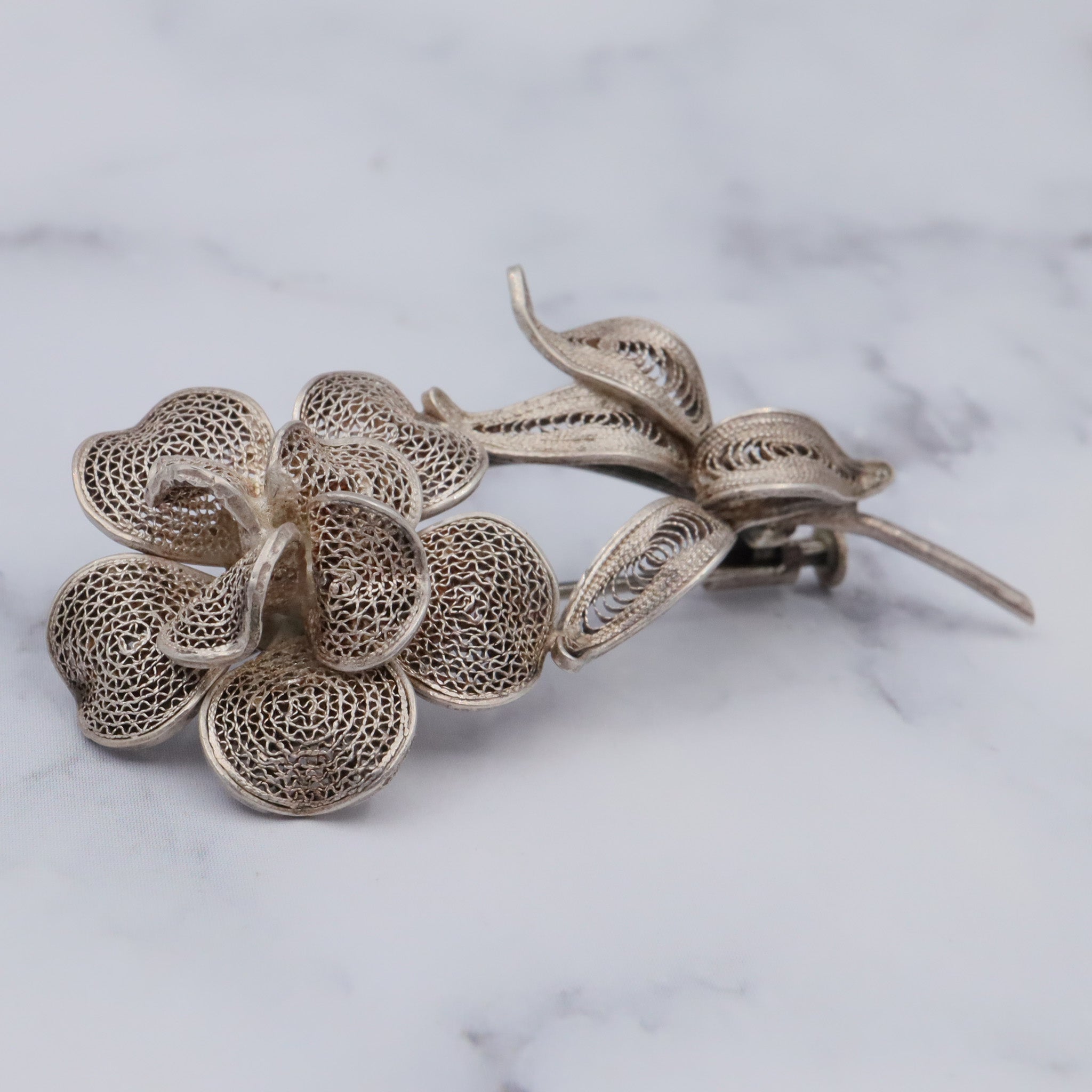 Vintage sterling filigree flower brooch