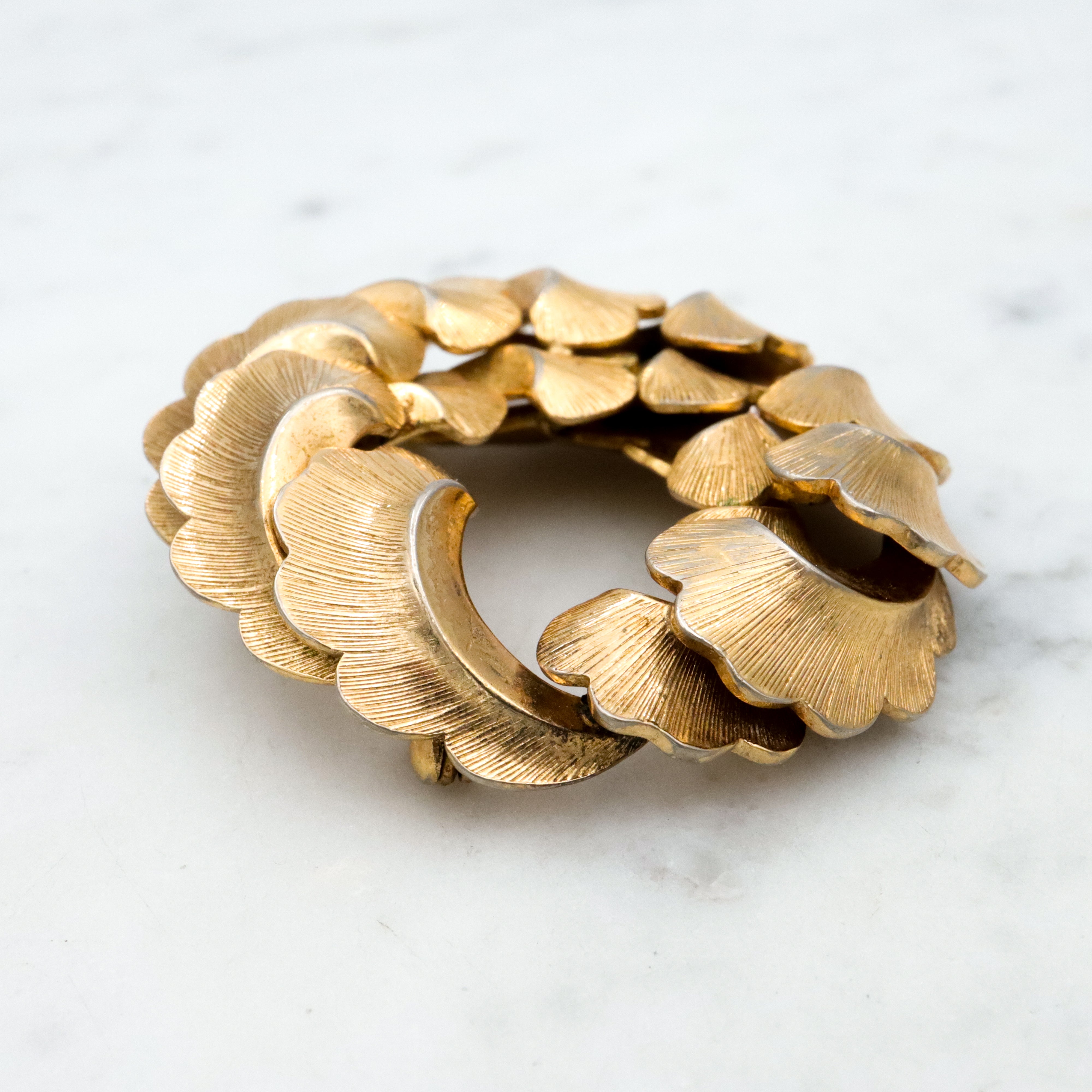 1958 Henkel & Grosse gold plated feather wreath brooch