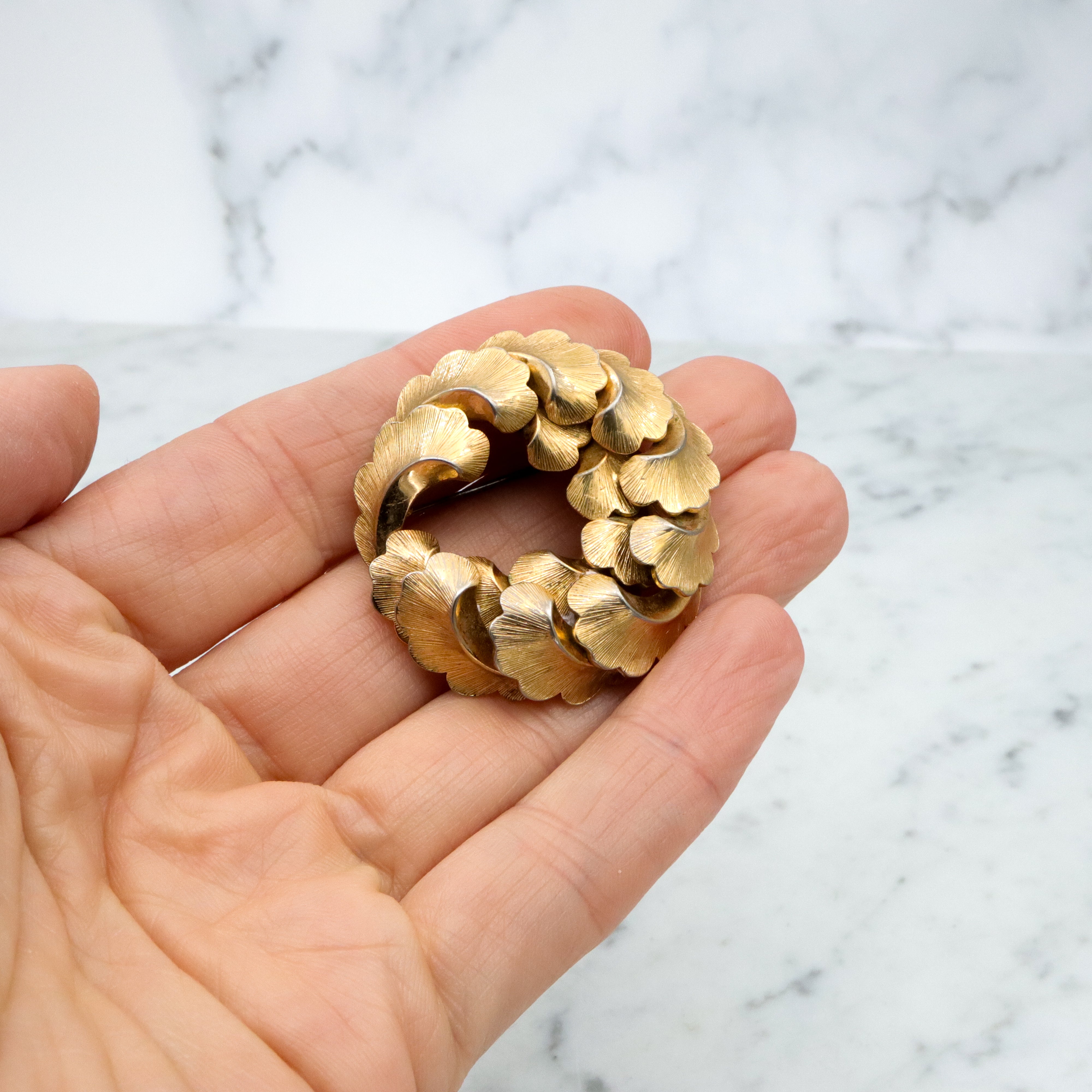 1958 Henkel & Grosse gold plated feather wreath brooch