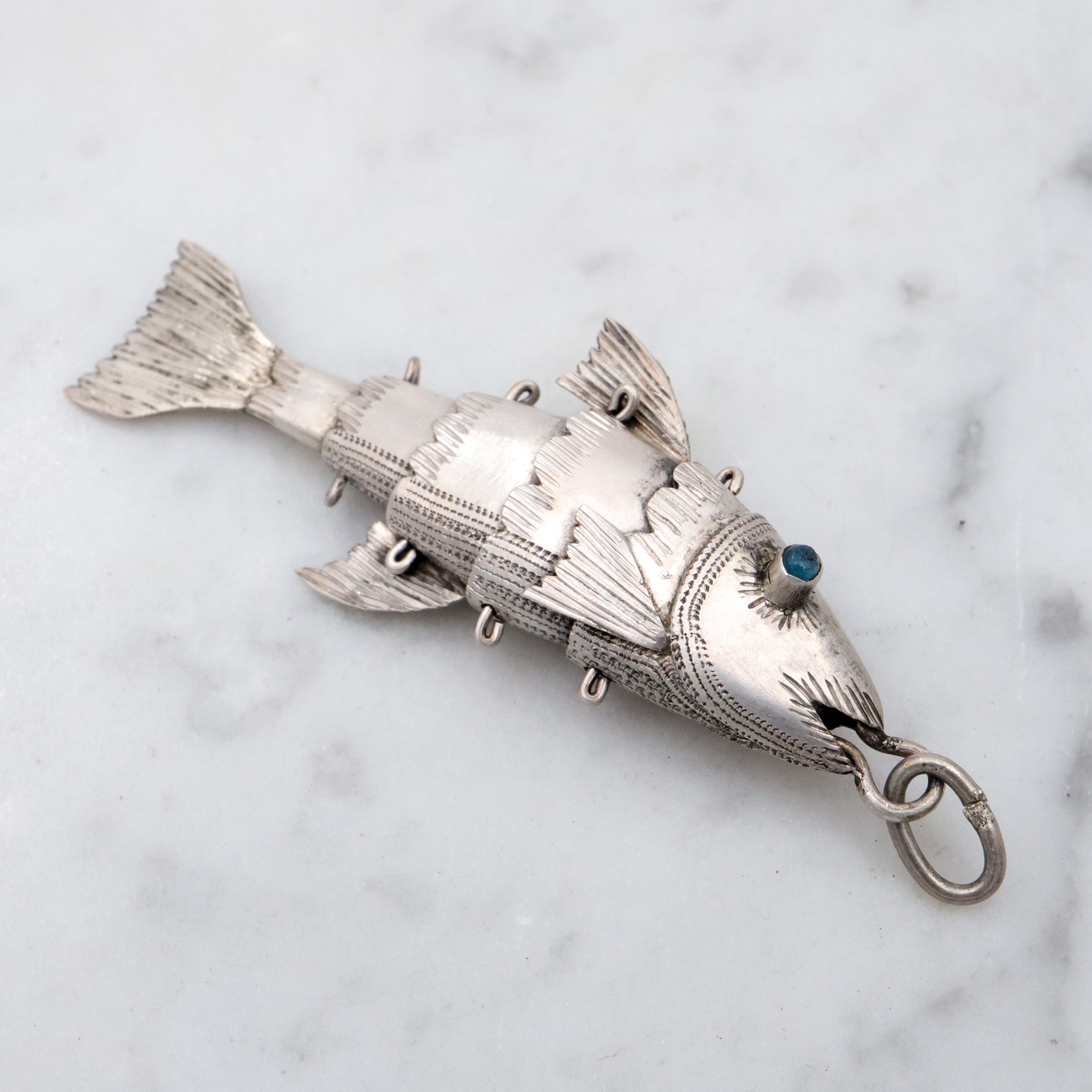 Antique handmade silver articulated fish pendant