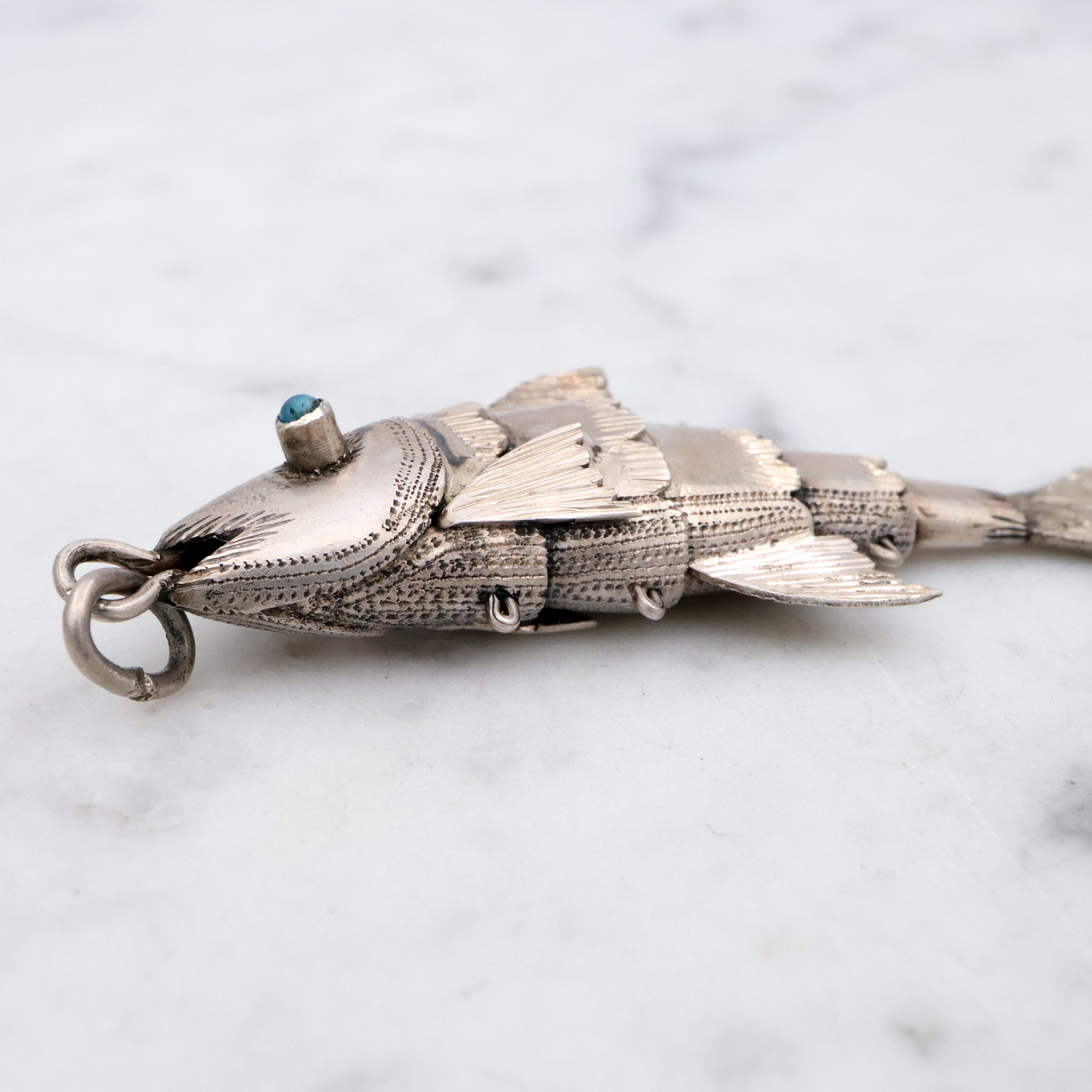 Antique handmade silver articulated fish pendant