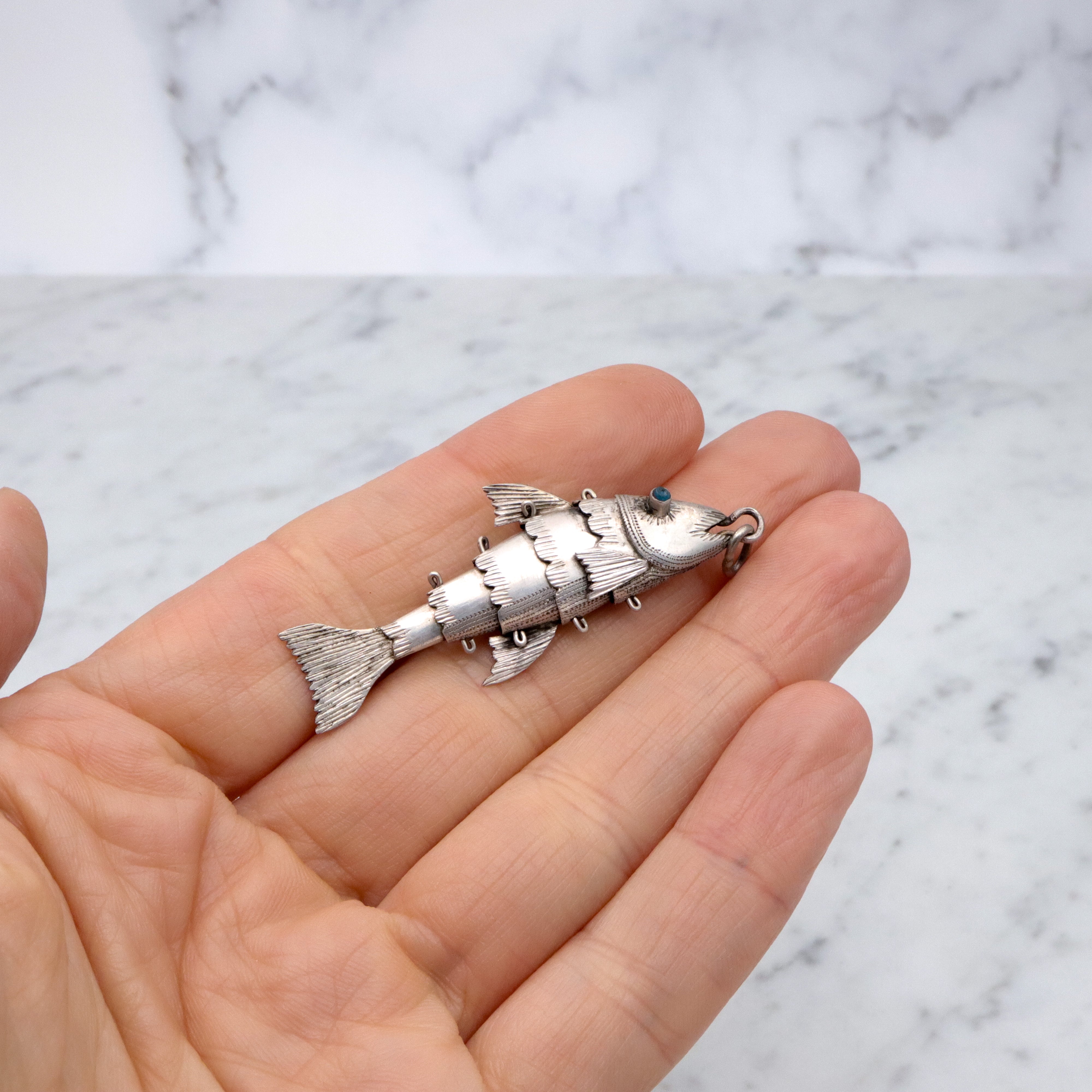 Antique handmade silver articulated fish pendant