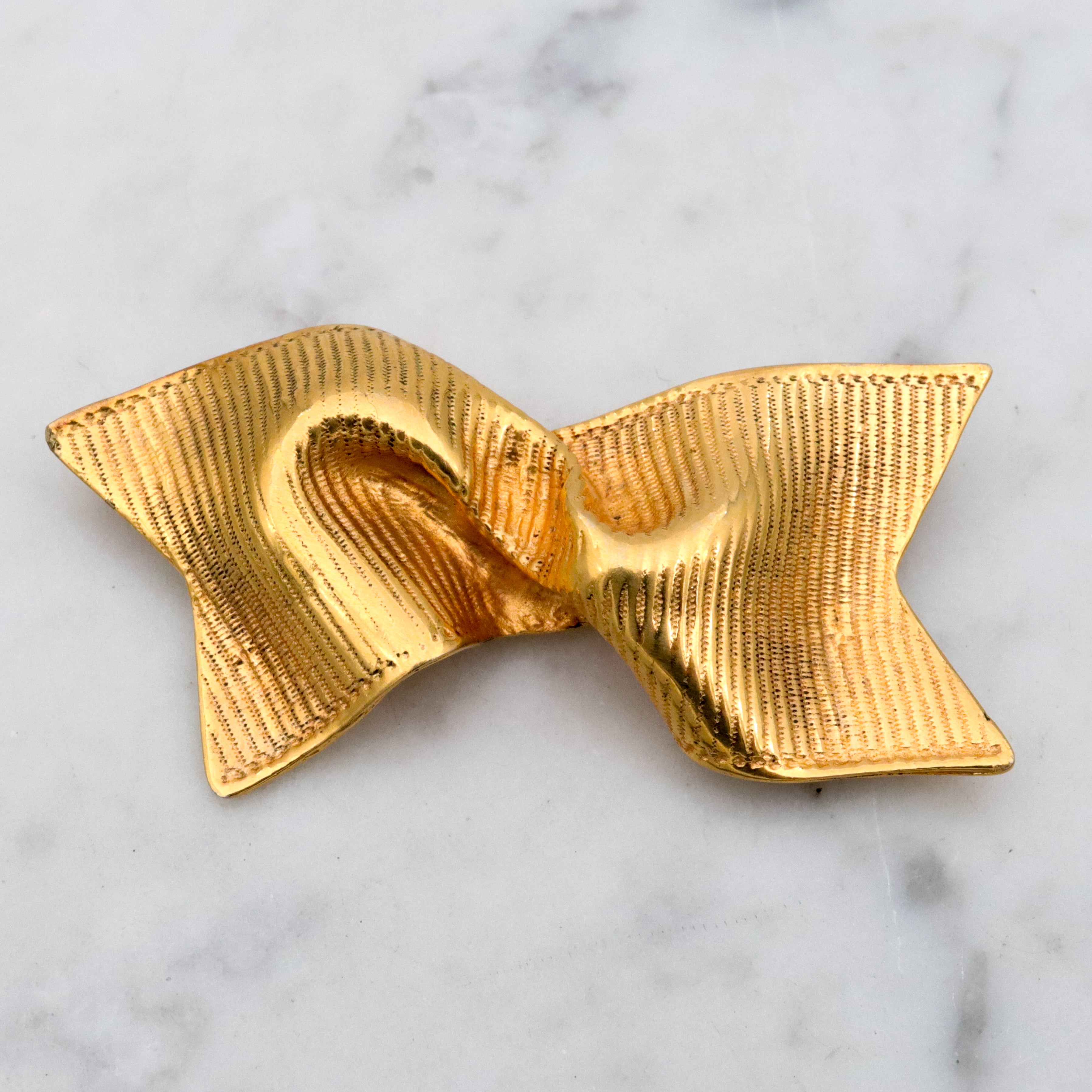 Retro Mignon Faget gold plated twisted ribbon brooch