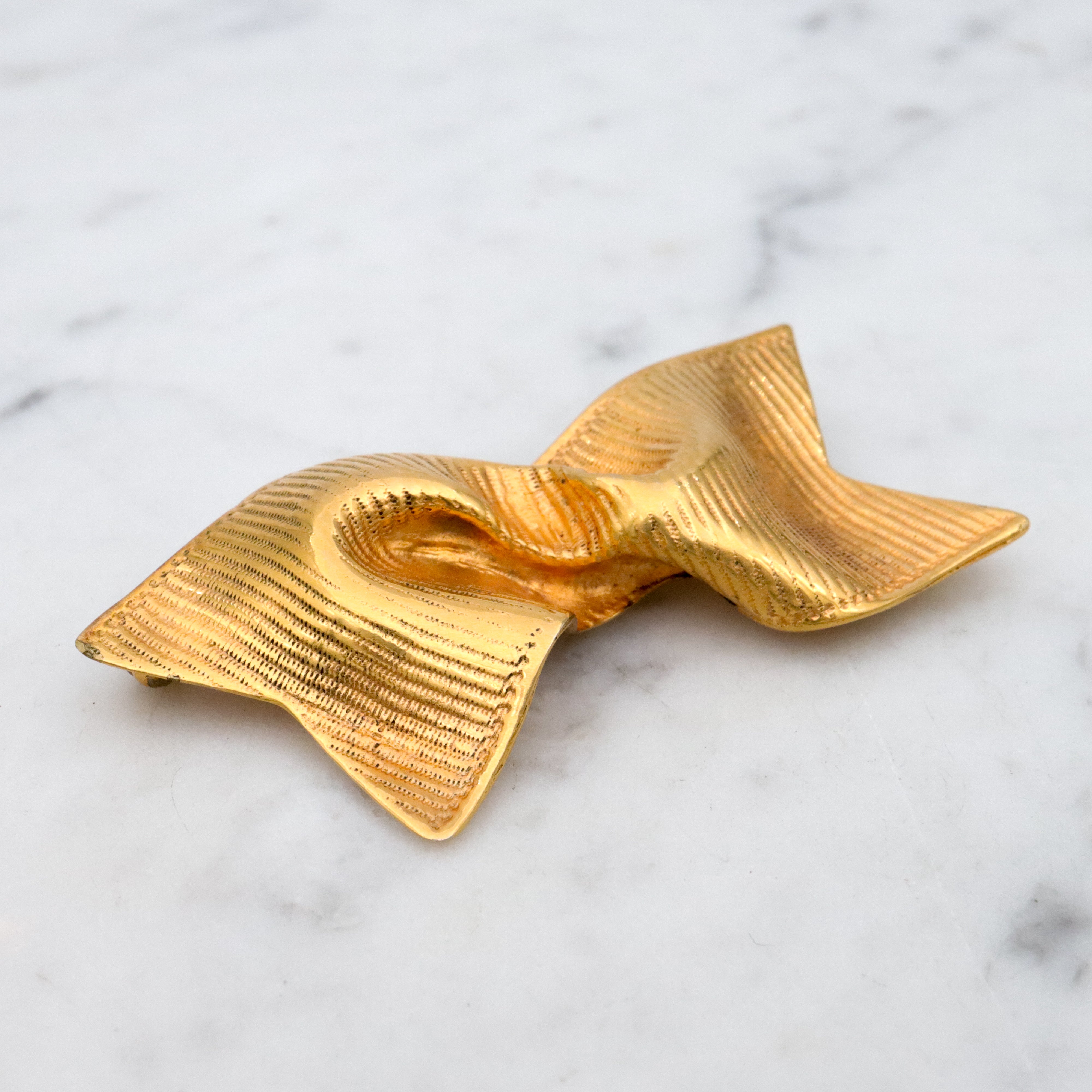 Retro Mignon Faget gold plated twisted ribbon brooch
