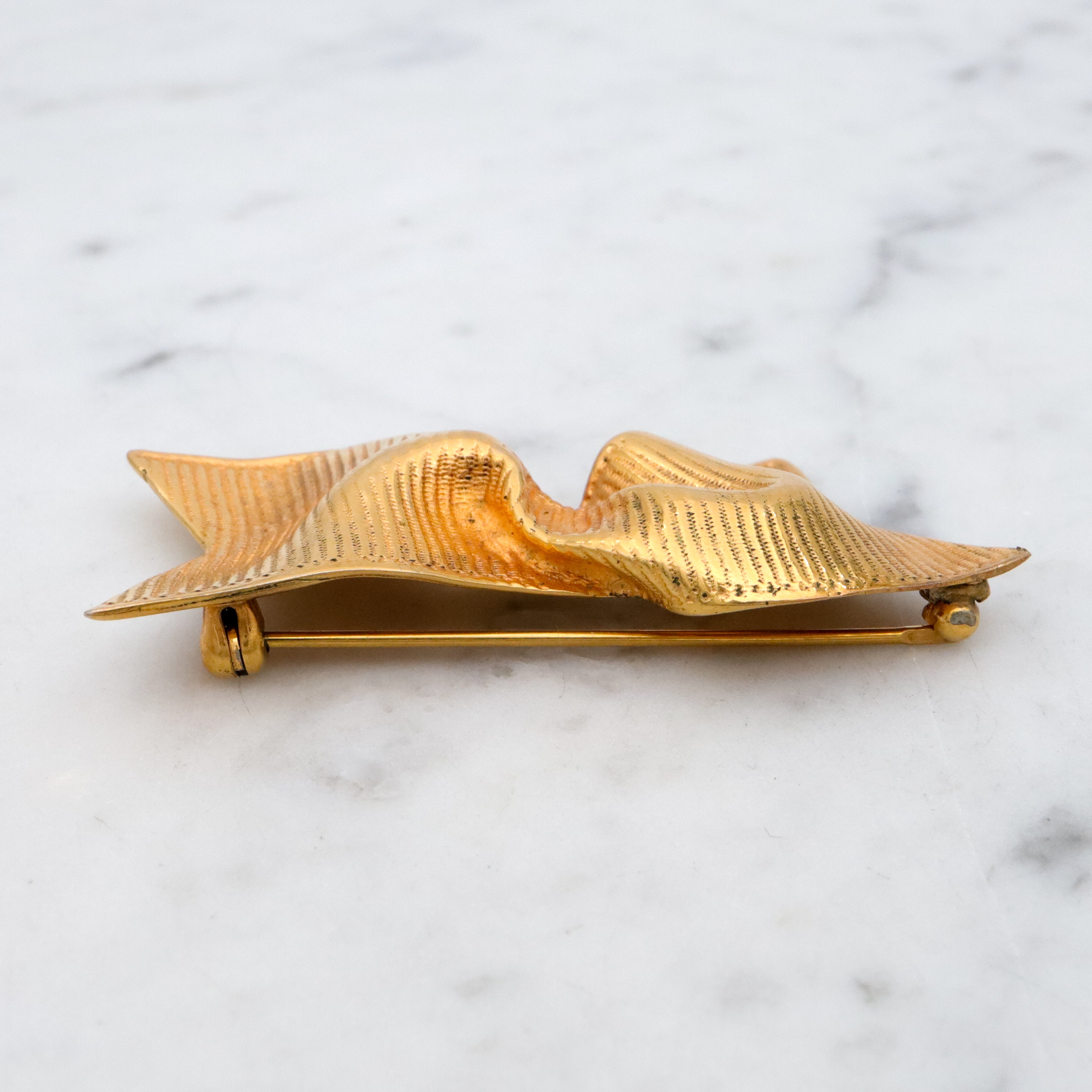 Retro Mignon Faget gold plated twisted ribbon brooch