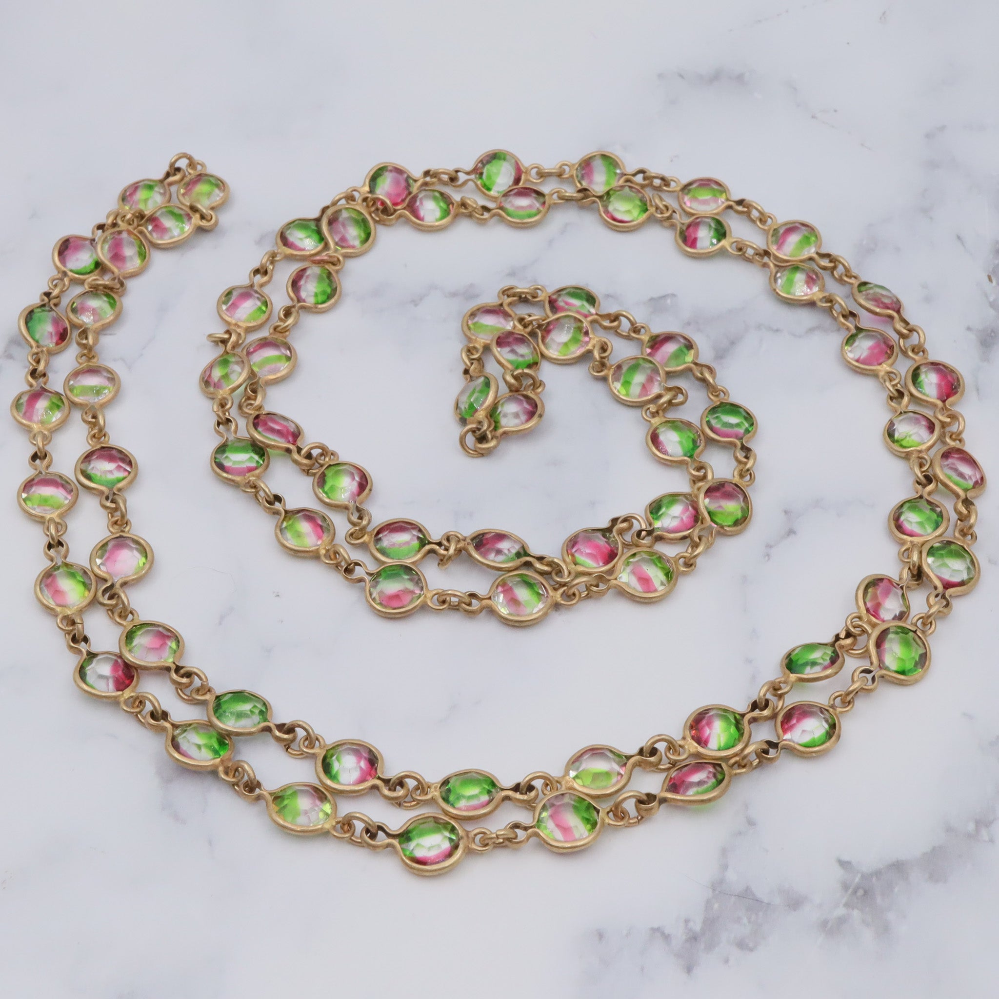 Vintage Austrian watermelon crystal bezel set brass necklace, 46”